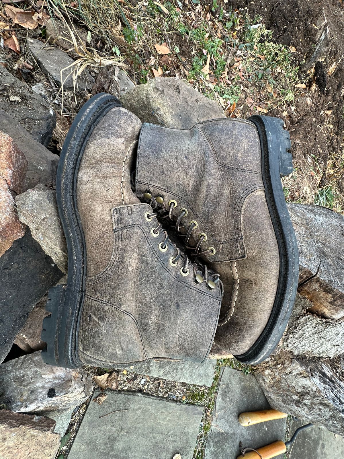 Photo by Ohmayer on December 2, 2024 of the Grant Stone Brass Boot in CF Stead Black Waxed Deerhide.