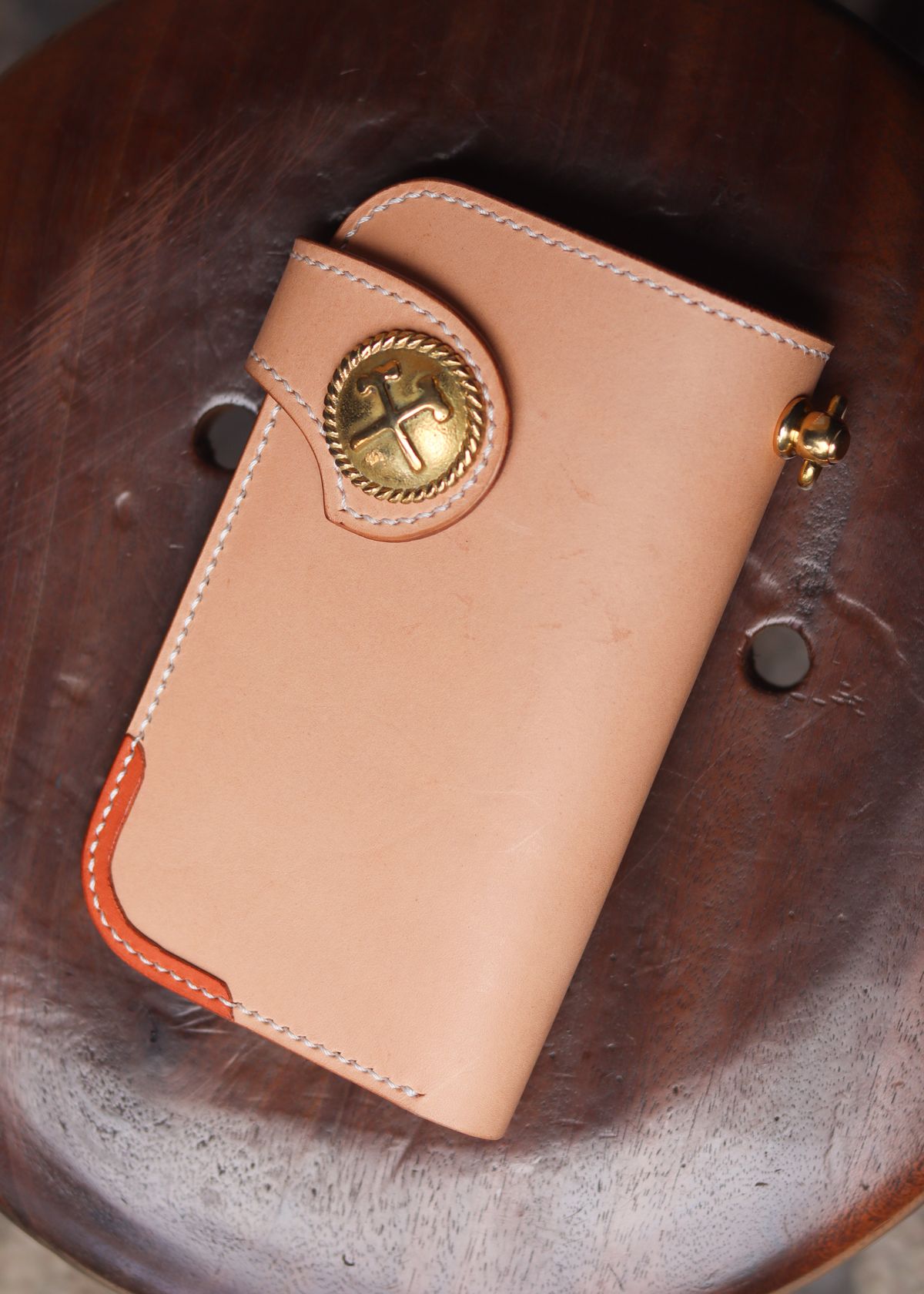 Photo by januardwijuang on October 1, 2025 of the Siege Leather Middle Concho Wallet in Indonesian Natural Veg Tan.