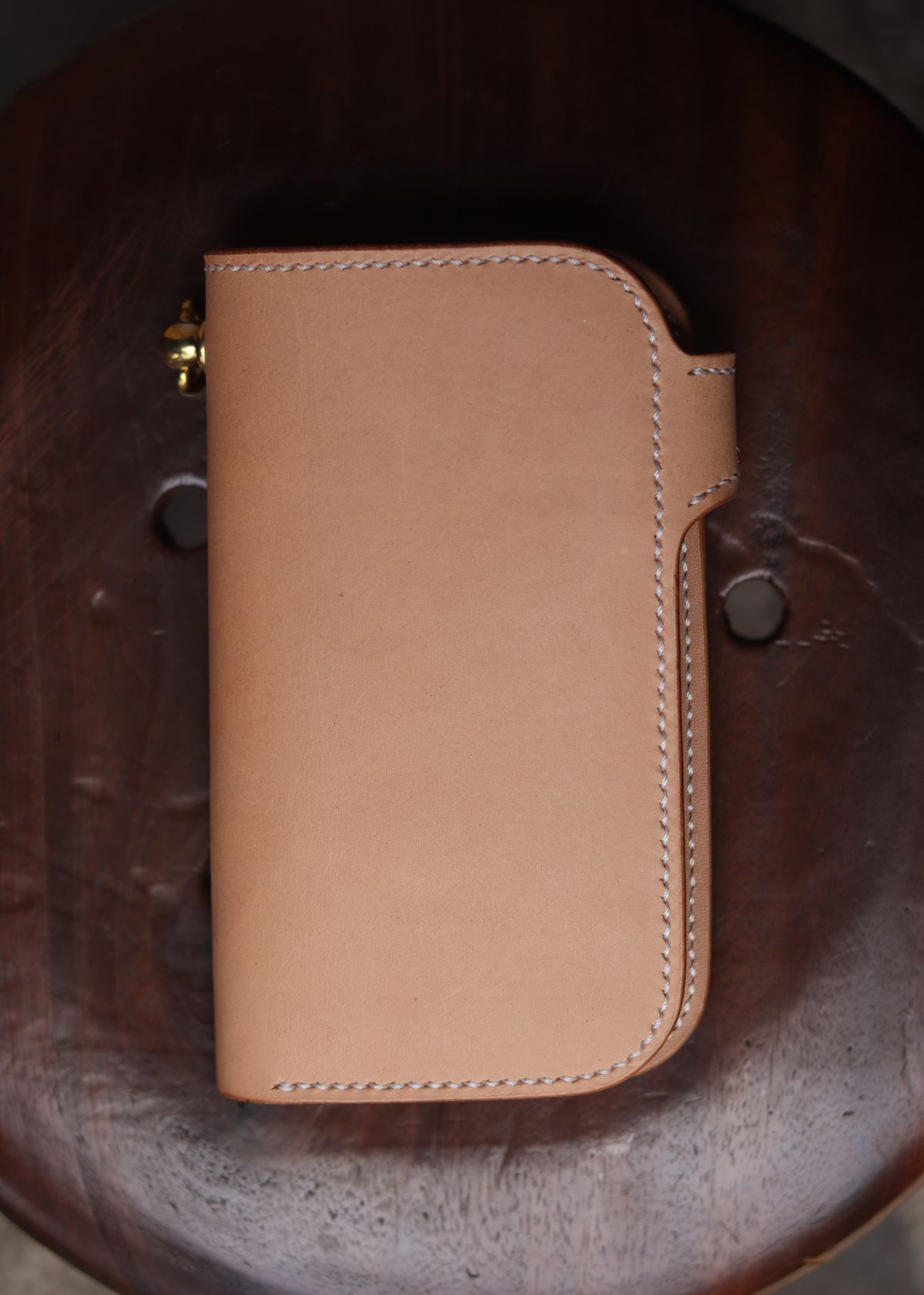 Photo by januardwijuang on October 1, 2025 of the Siege Leather Middle Concho Wallet in Indonesian Natural Veg Tan.
