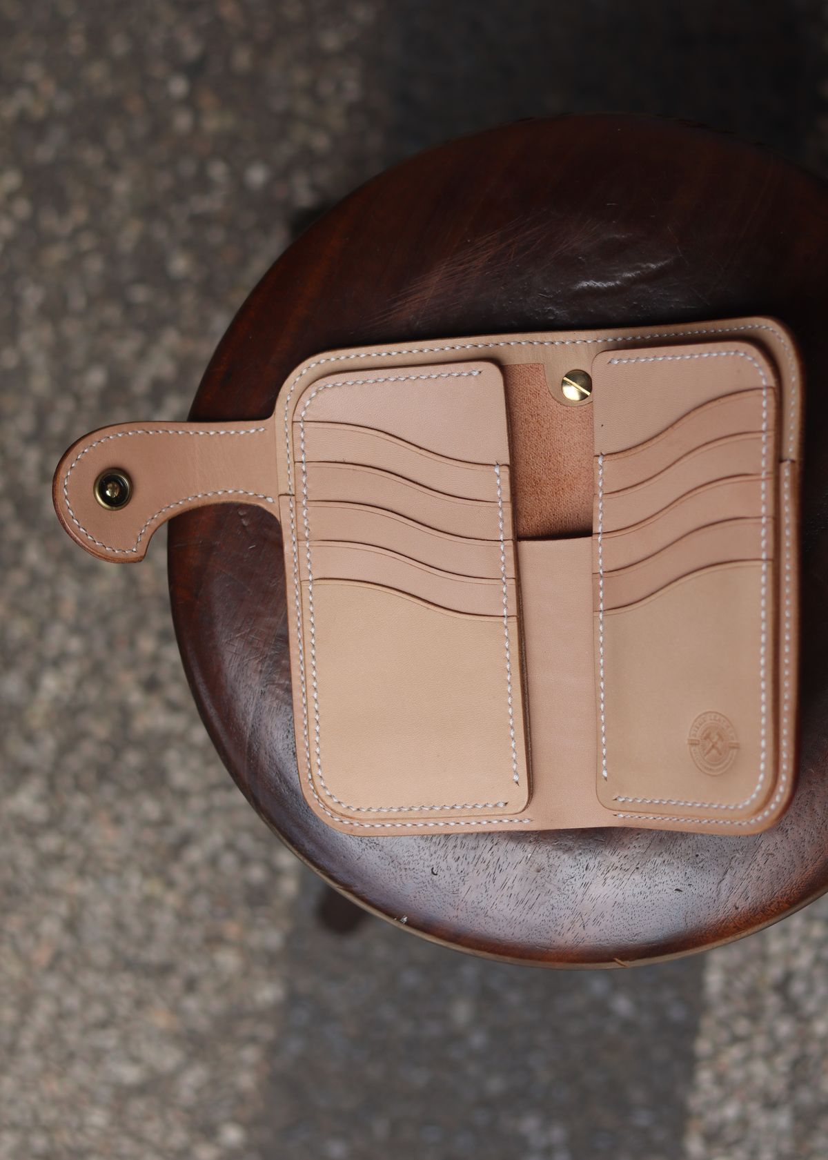 Photo by januardwijuang on October 1, 2025 of the Siege Leather Middle Concho Wallet in Indonesian Natural Veg Tan.