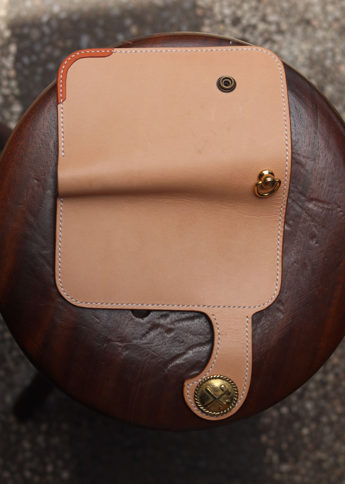 Photo by januardwijuang on October 1, 2025 of the Siege Leather Middle Concho Wallet in Indonesian Natural Veg Tan.