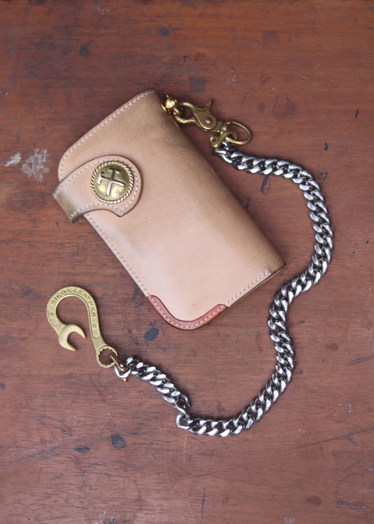 Photo by januardwijuang on November 4, 2025 of the Siege Leather Middle Concho Wallet in Indonesian Natural Veg Tan.
