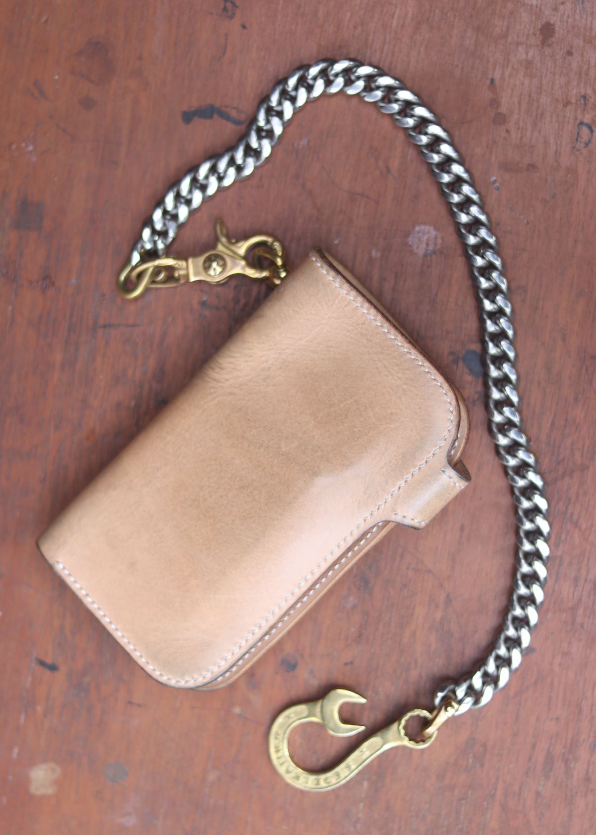 Photo by januardwijuang on November 4, 2025 of the Siege Leather Middle Concho Wallet in Indonesian Natural Veg Tan.
