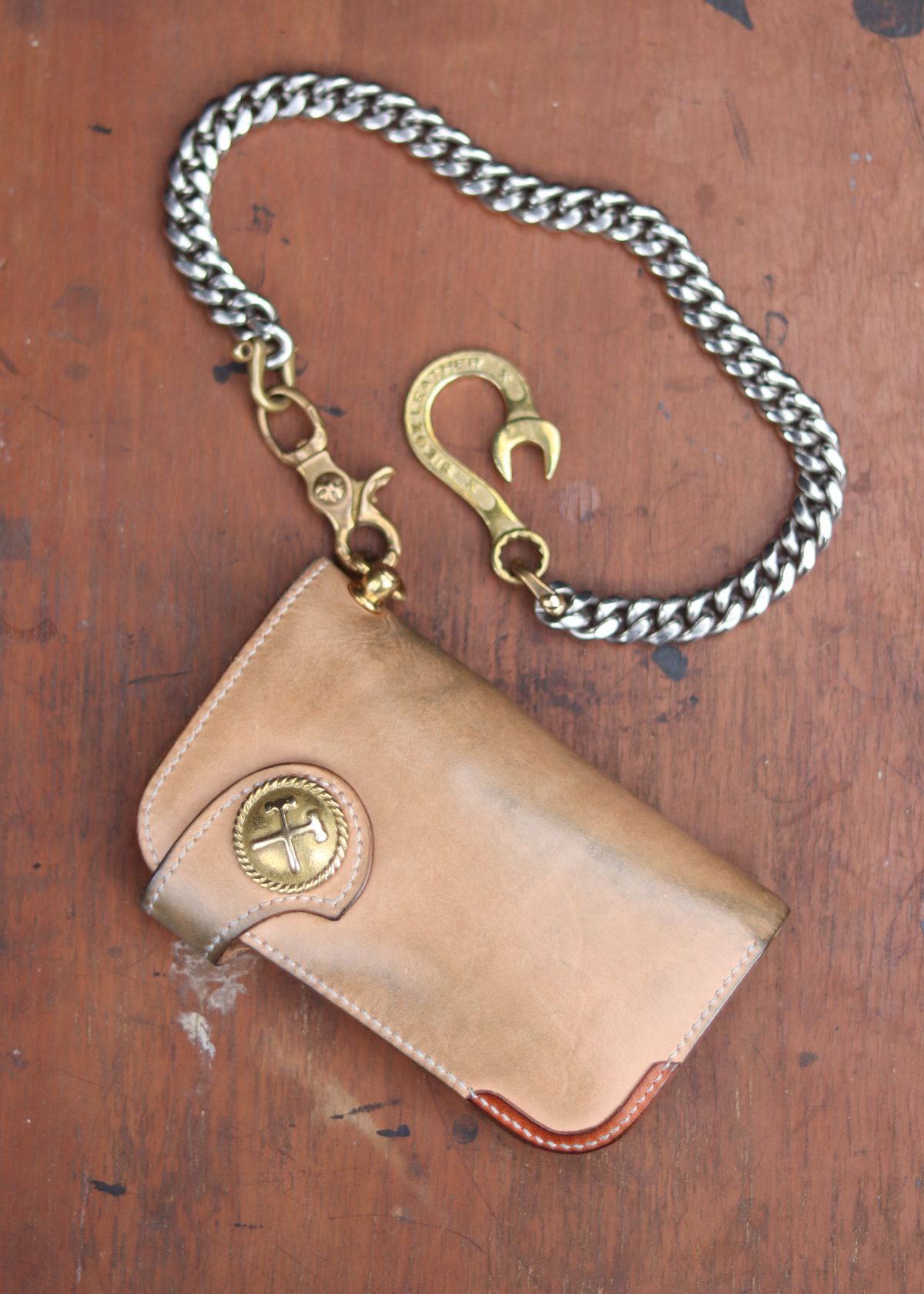 Photo by januardwijuang on November 30, 2025 of the Siege Leather Middle Concho Wallet in Indonesian Natural Veg Tan.