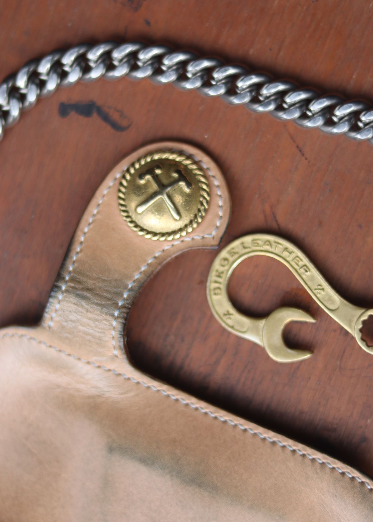 Photo by januardwijuang on November 30, 2025 of the Siege Leather Middle Concho Wallet in Indonesian Natural Veg Tan.