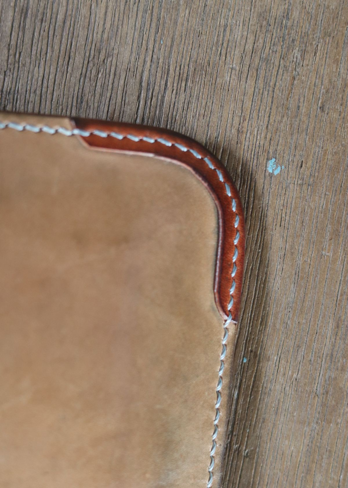 Photo by januardwijuang on December 31, 2025 of the Siege Leather Middle Concho Wallet in Indonesian Natural Veg Tan.