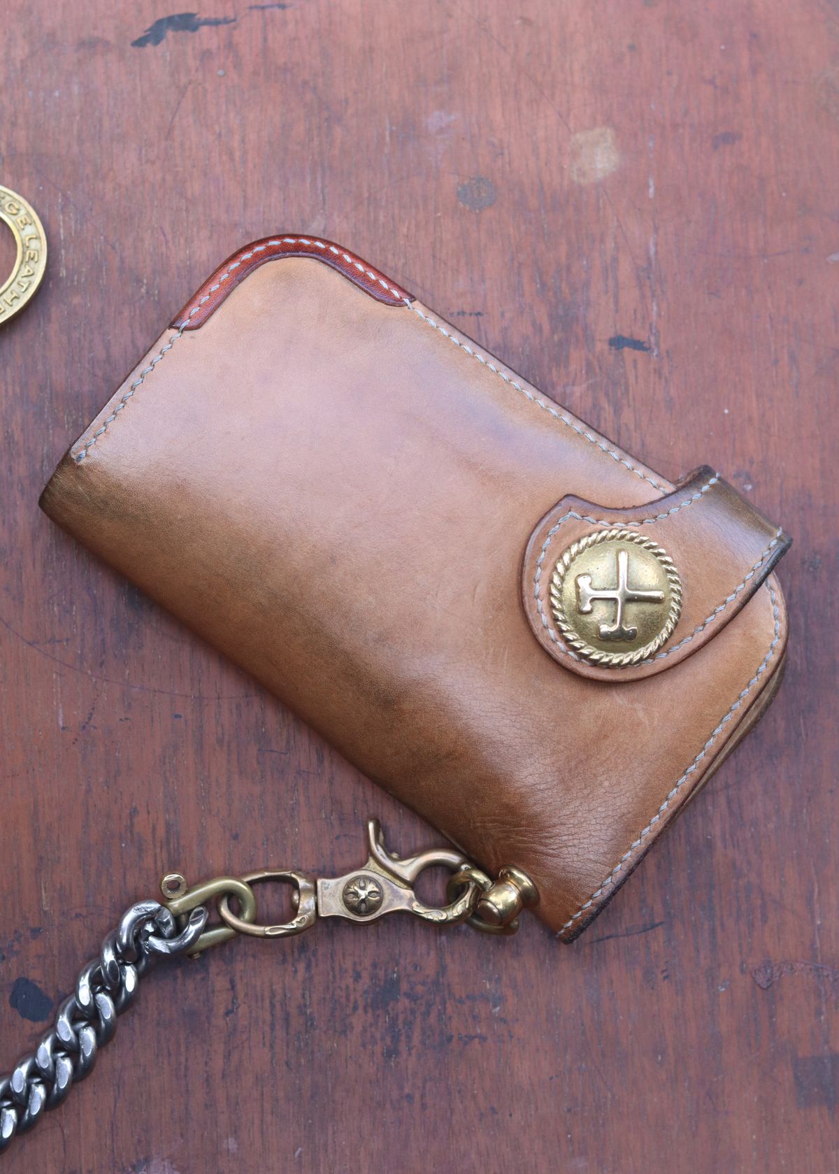 Photo by januardwijuang on February 3, 2026 of the Siege Leather Middle Concho Wallet in Indonesian Natural Veg Tan.
