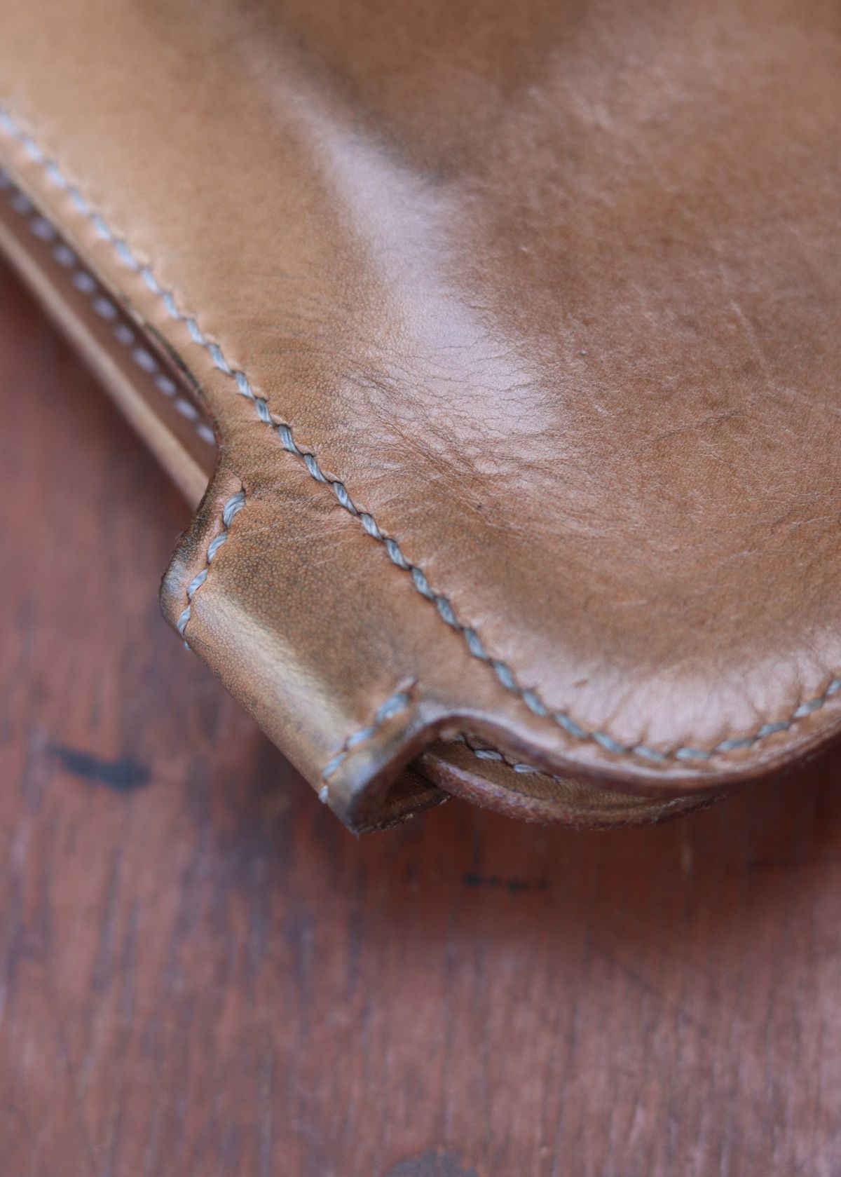 Photo by januardwijuang on February 3, 2026 of the Siege Leather Middle Concho Wallet in Indonesian Natural Veg Tan.