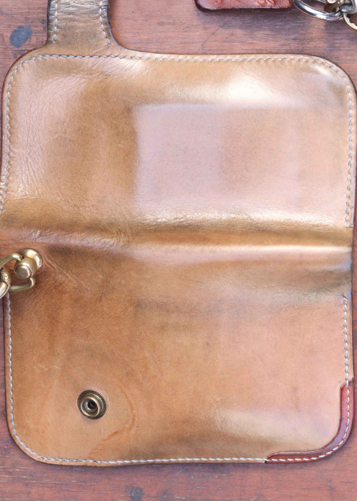 Photo by januardwijuang on February 3, 2026 of the Siege Leather Middle Concho Wallet in Indonesian Natural Veg Tan.