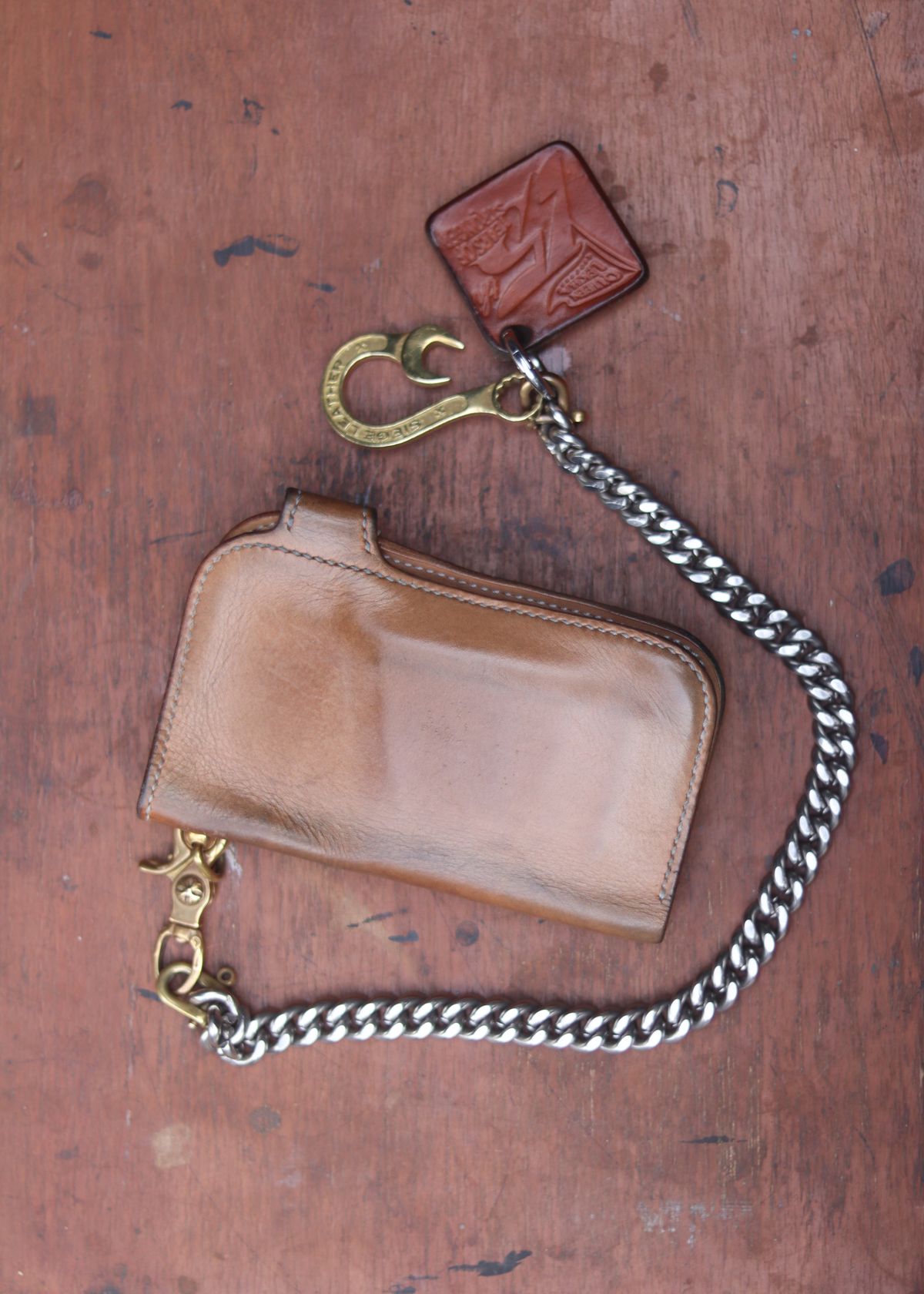 Photo by januardwijuang on March 1, 2026 of the Siege Leather Middle Concho Wallet in Indonesian Natural Veg Tan.