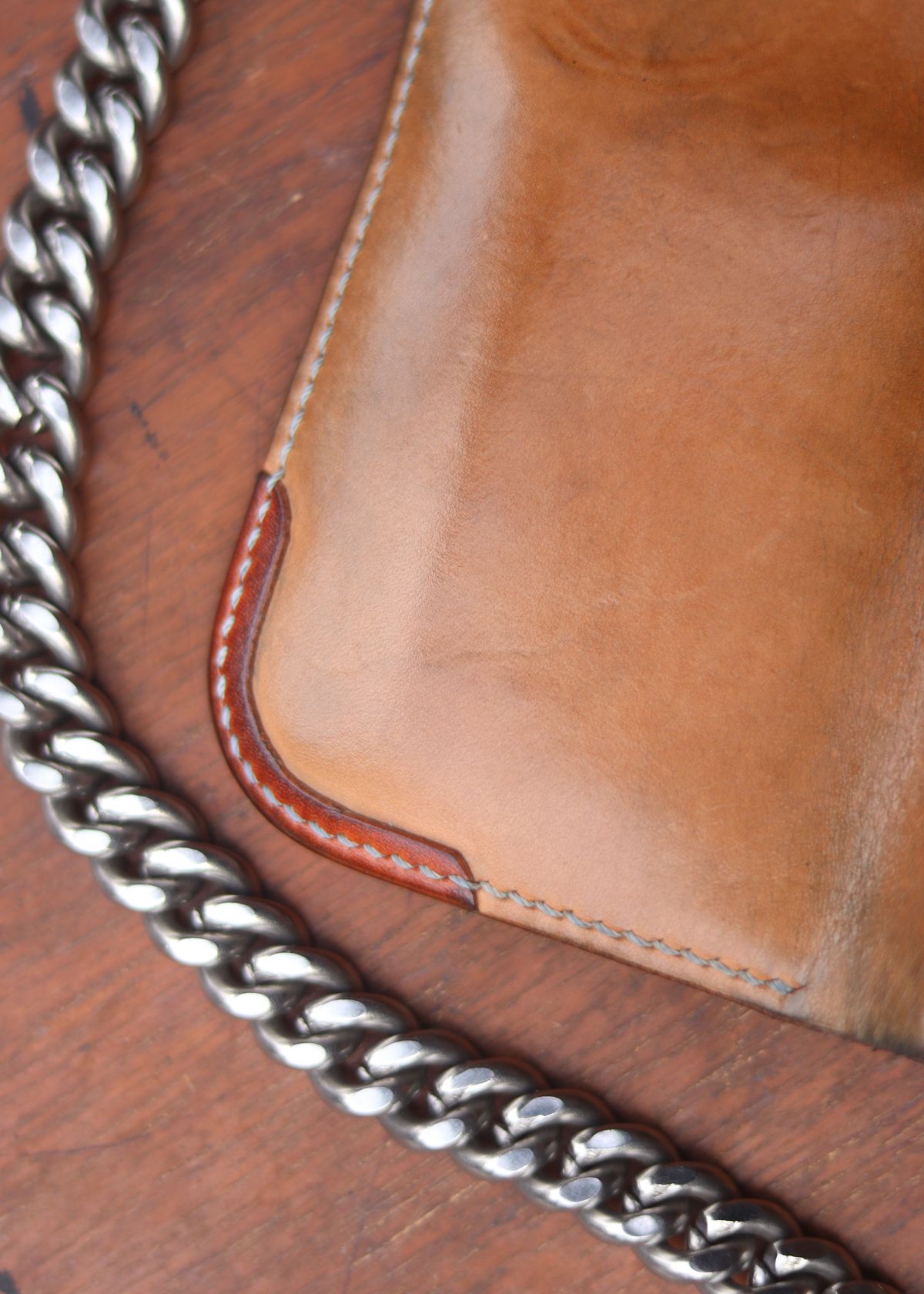 Photo by januardwijuang on March 1, 2026 of the Siege Leather Middle Concho Wallet in Indonesian Natural Veg Tan.
