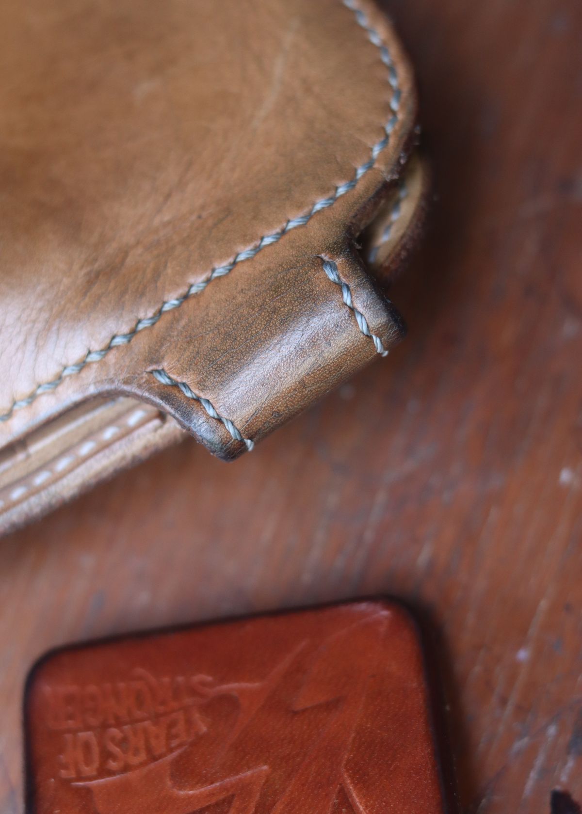 Photo by januardwijuang on March 31, 2026 of the Siege Leather Middle Concho Wallet in Indonesian Natural Veg Tan.