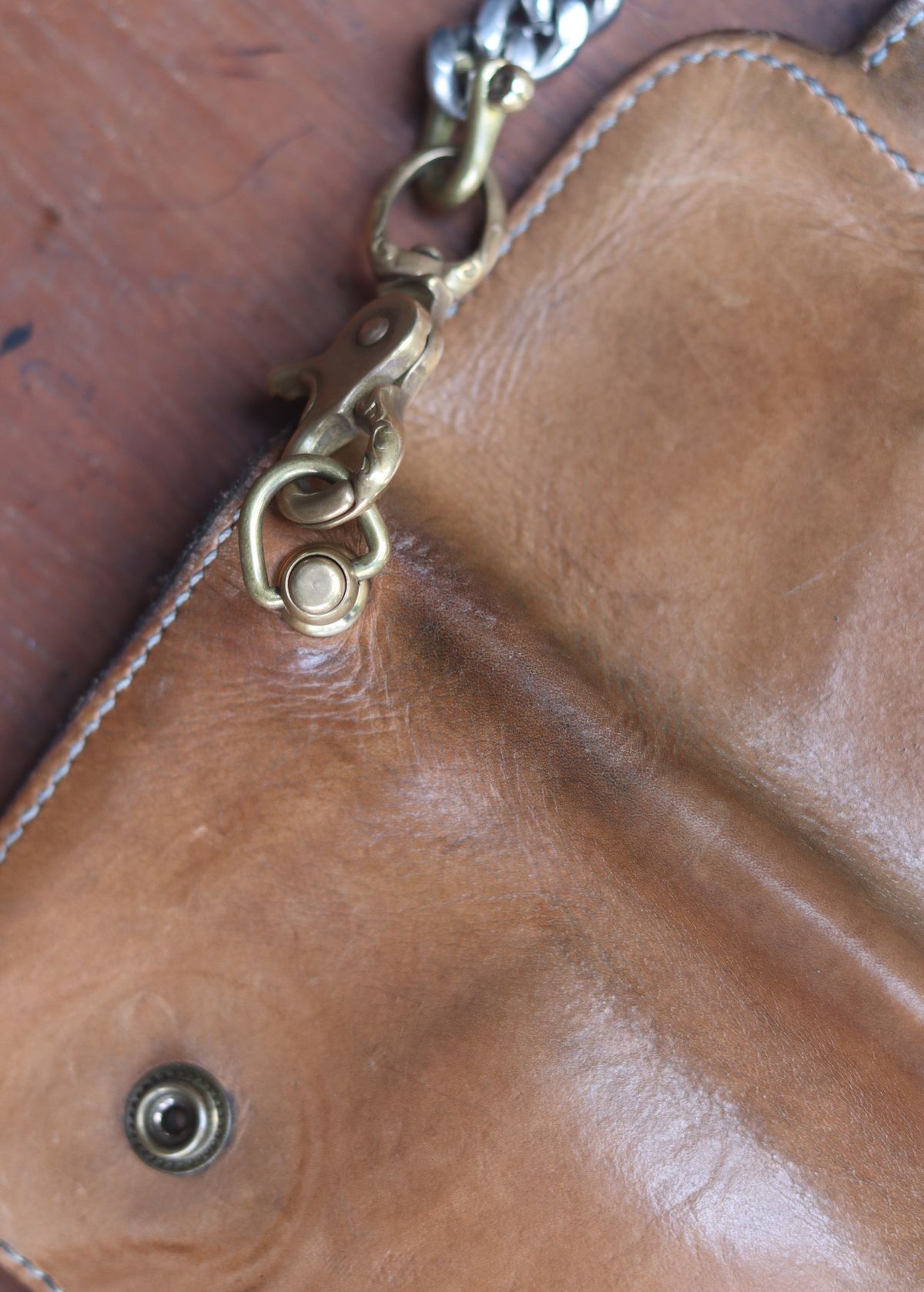 Photo by januardwijuang on March 31, 2026 of the Siege Leather Middle Concho Wallet in Indonesian Natural Veg Tan.