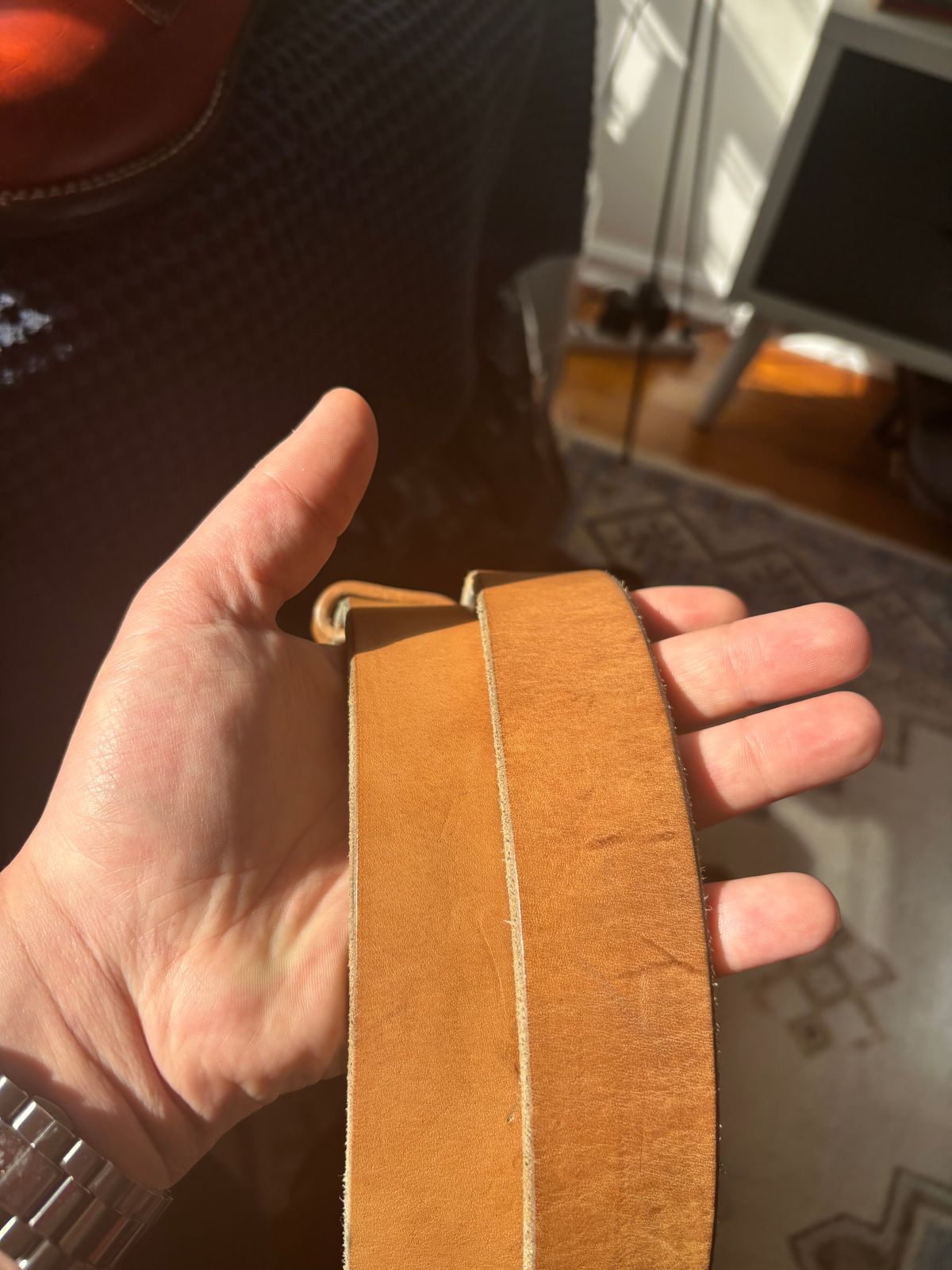 Photo by bootbastard on November 1, 2025 of the Carmine Jack Leather J&FJ Baker Natural Oak Bark Bridle Belts in J&FJ Baker Natural Oak Bark Tanned Harness.