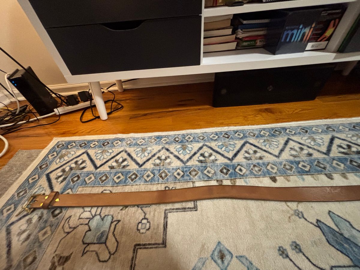 Photo by bootbastard on December 6, 2025 of the Carmine Jack Leather J&FJ Baker Natural Oak Bark Bridle Belts in J&FJ Baker Natural Oak Bark Tanned Harness.