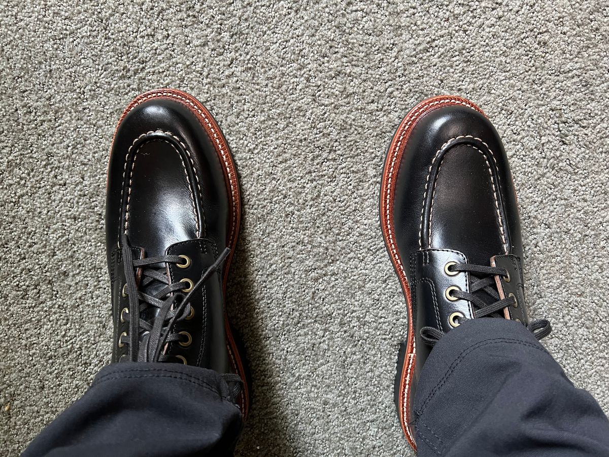 Photo by Crumbledor on July 11, 2022 of the Grant Stone Brass Boot in Horween Black Chromexcel.