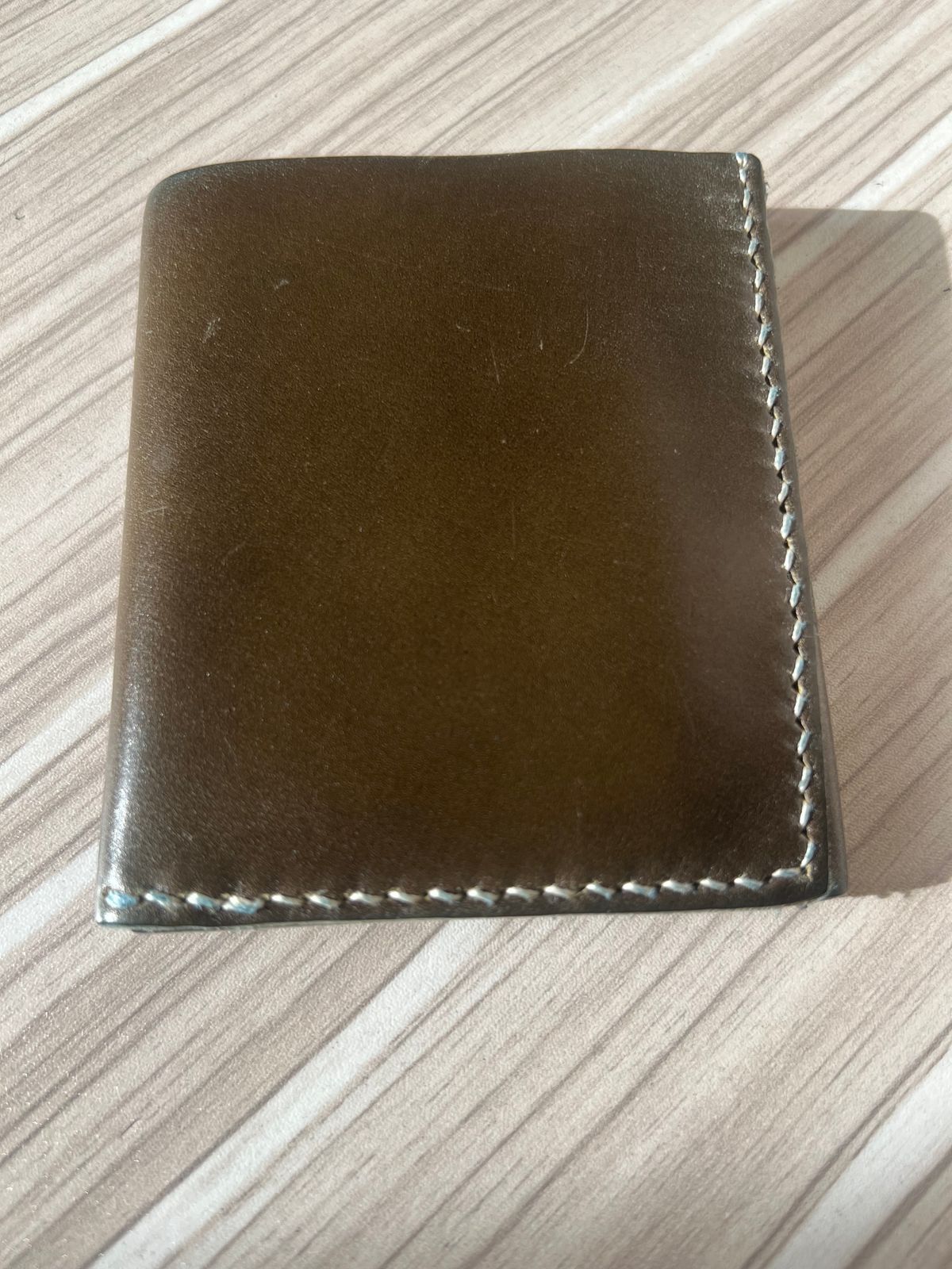 Photo by elmer.richard on December 5, 2025 of the Sentillanosa Minimalist Trifold Wallet in Shinki Olive Shell Cordovan.