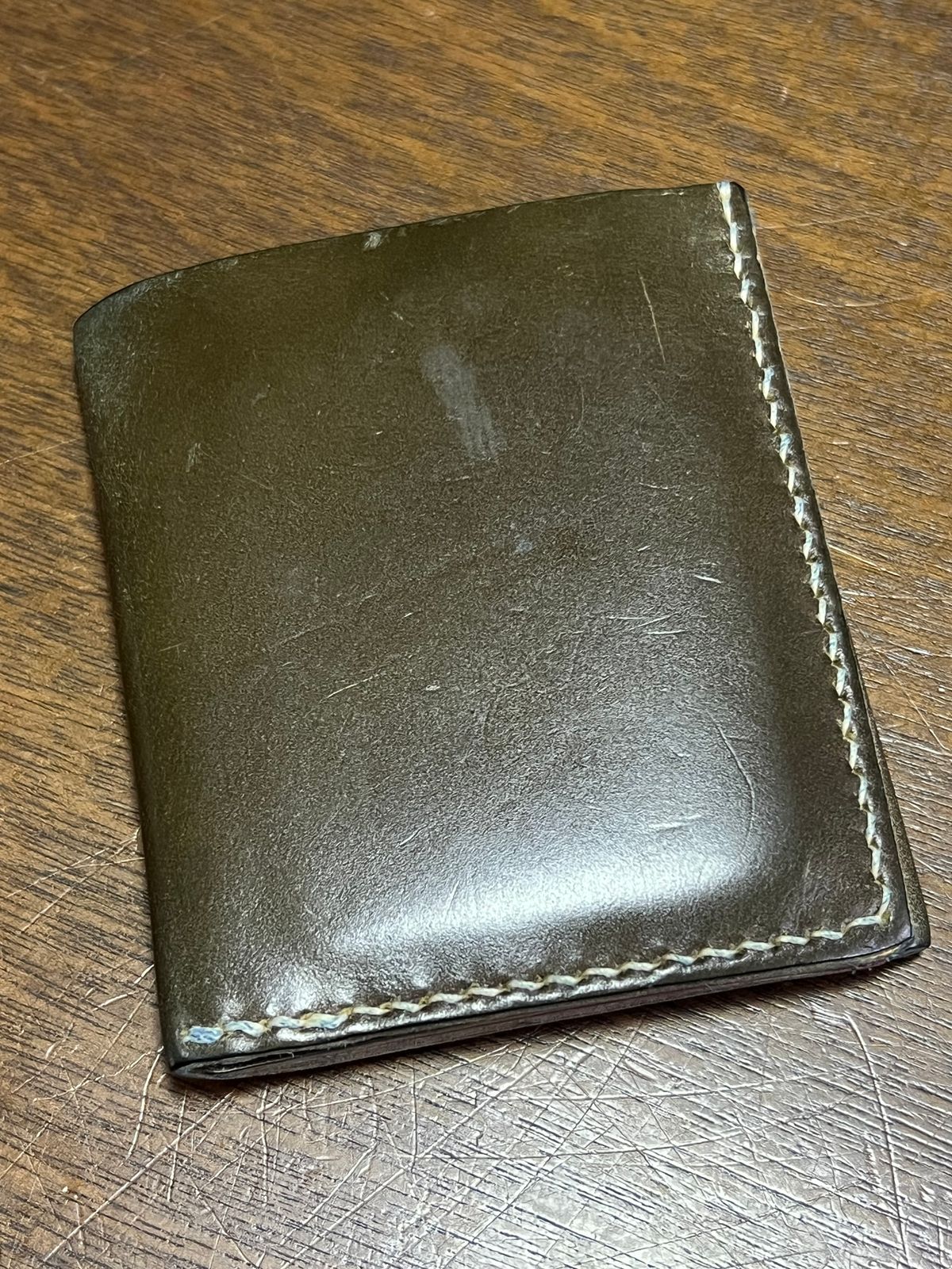 Photo by elmer.richard on February 4, 2026 of the Sentillanosa Minimalist Trifold Wallet in Shinki Olive Shell Cordovan.