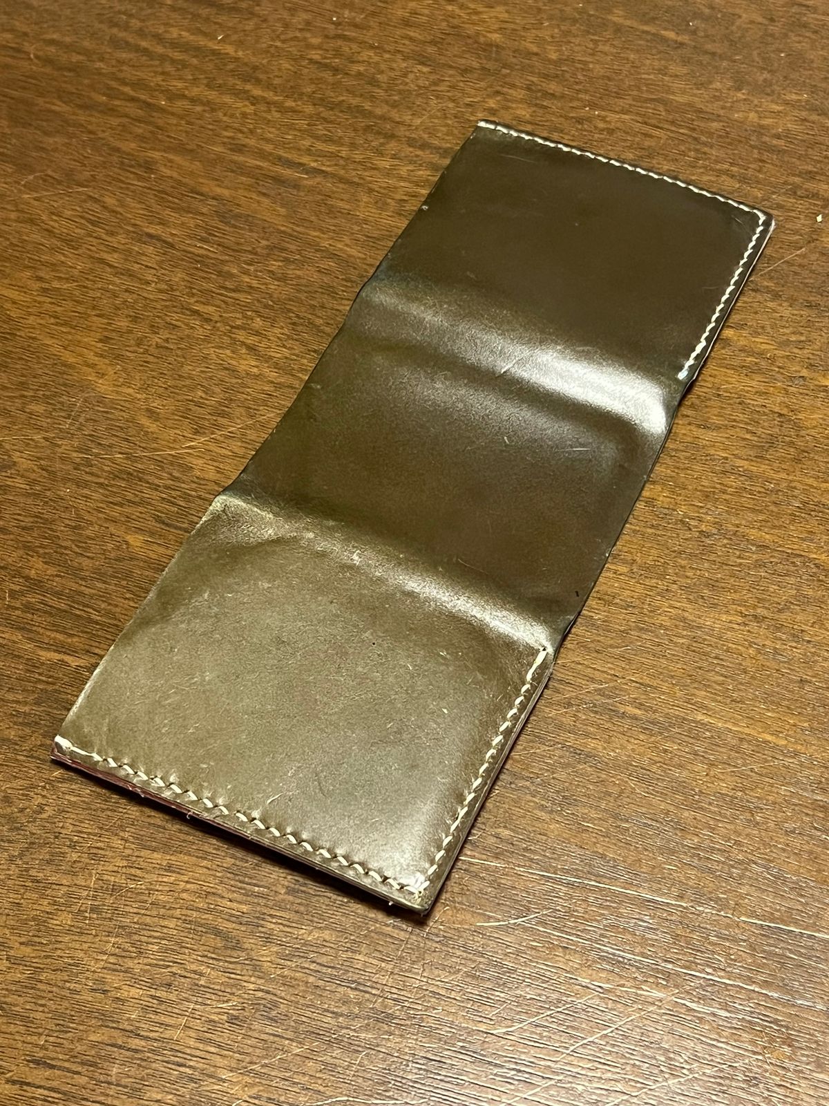 Photo by elmer.richard on February 4, 2026 of the Sentillanosa Minimalist Trifold Wallet in Shinki Olive Shell Cordovan.