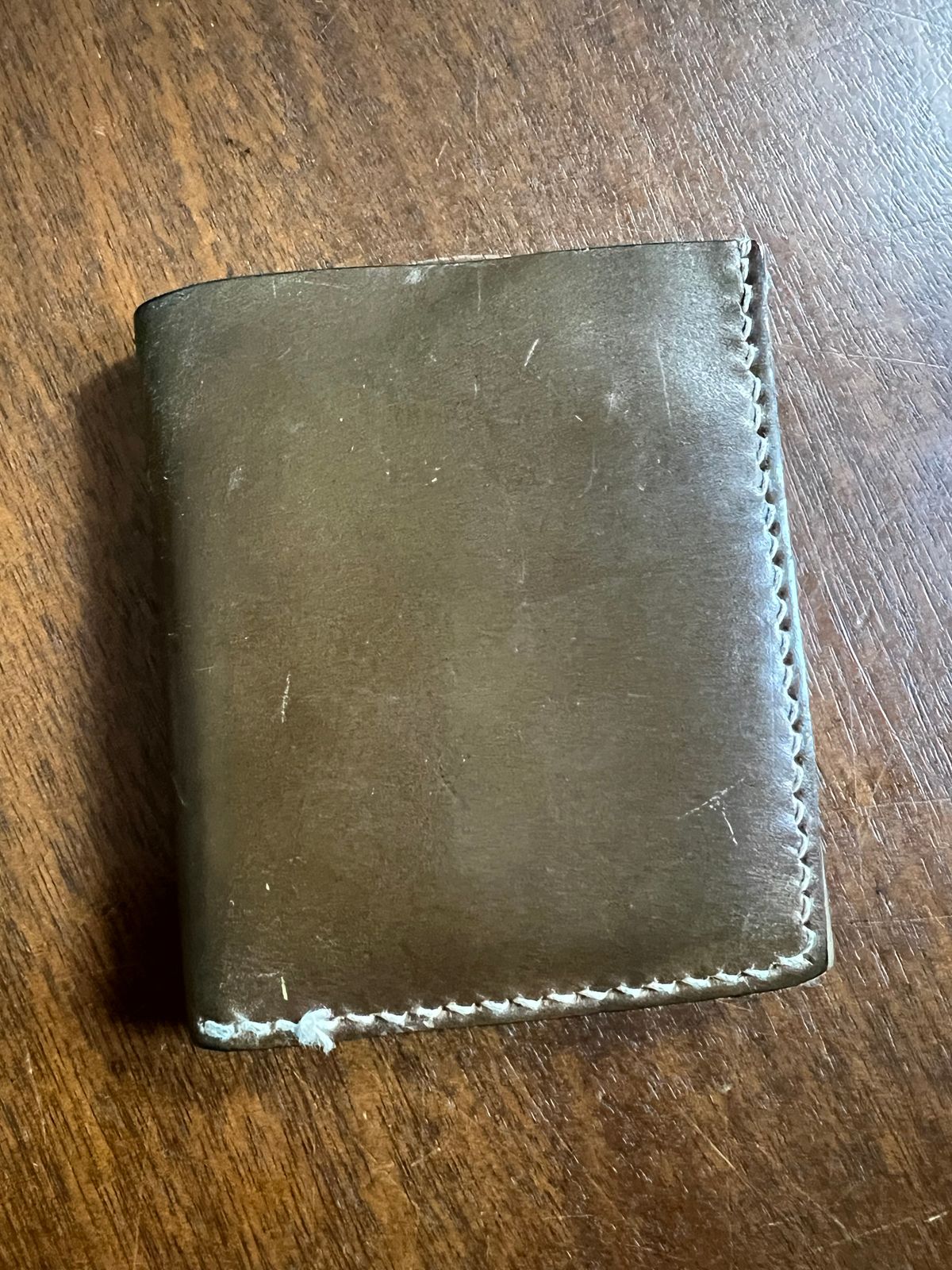 Photo by elmer.richard on April 6, 2026 of the Sentillanosa Minimalist Trifold Wallet in Shinki Olive Shell Cordovan.