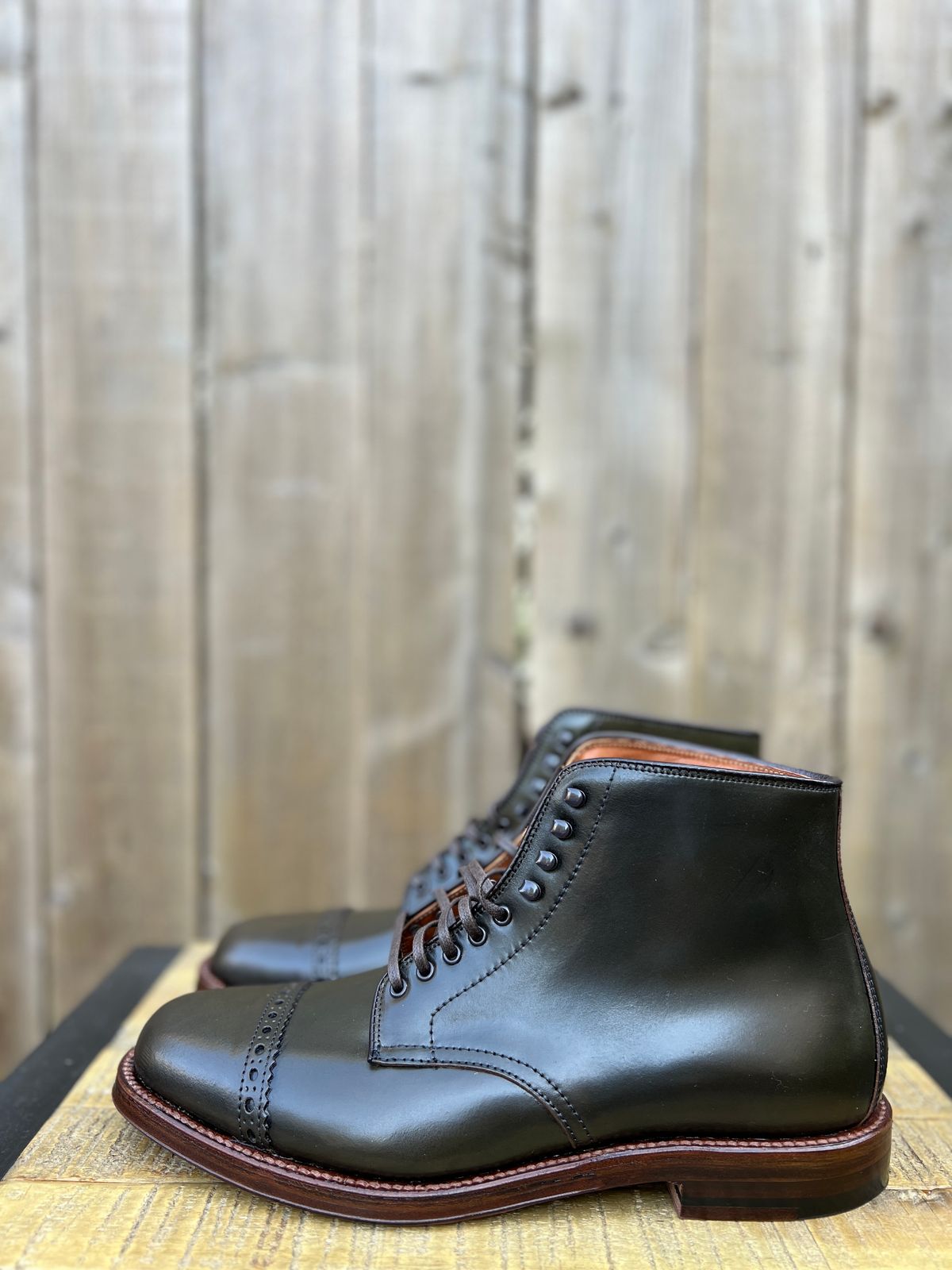 Photo by JupiterIsBeautiful on October 2, 2022 of the Alden Perforated Cap Toe Boot in Horween Old Bronze Shell Cordovan.