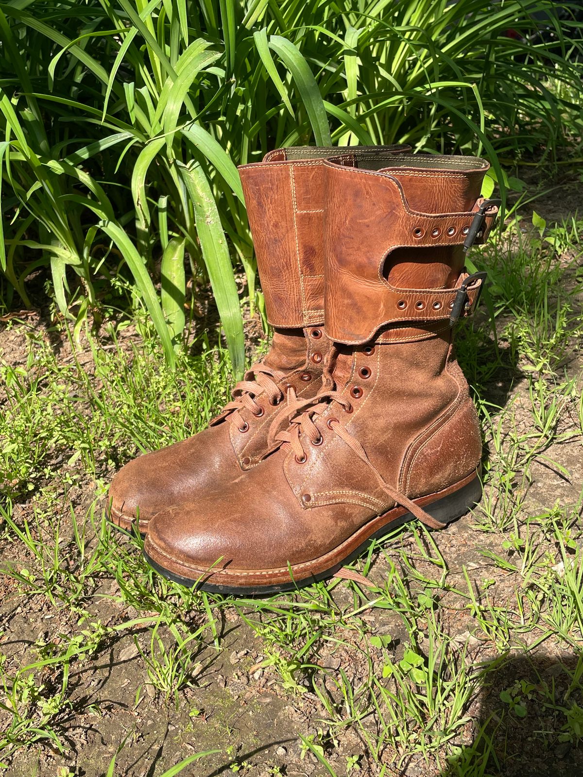 Photo by 9268Klondike on June 11, 2023 of the Boston Shoe Co. M-1943 "Double Buckle" Service Boots in Combination Tan.