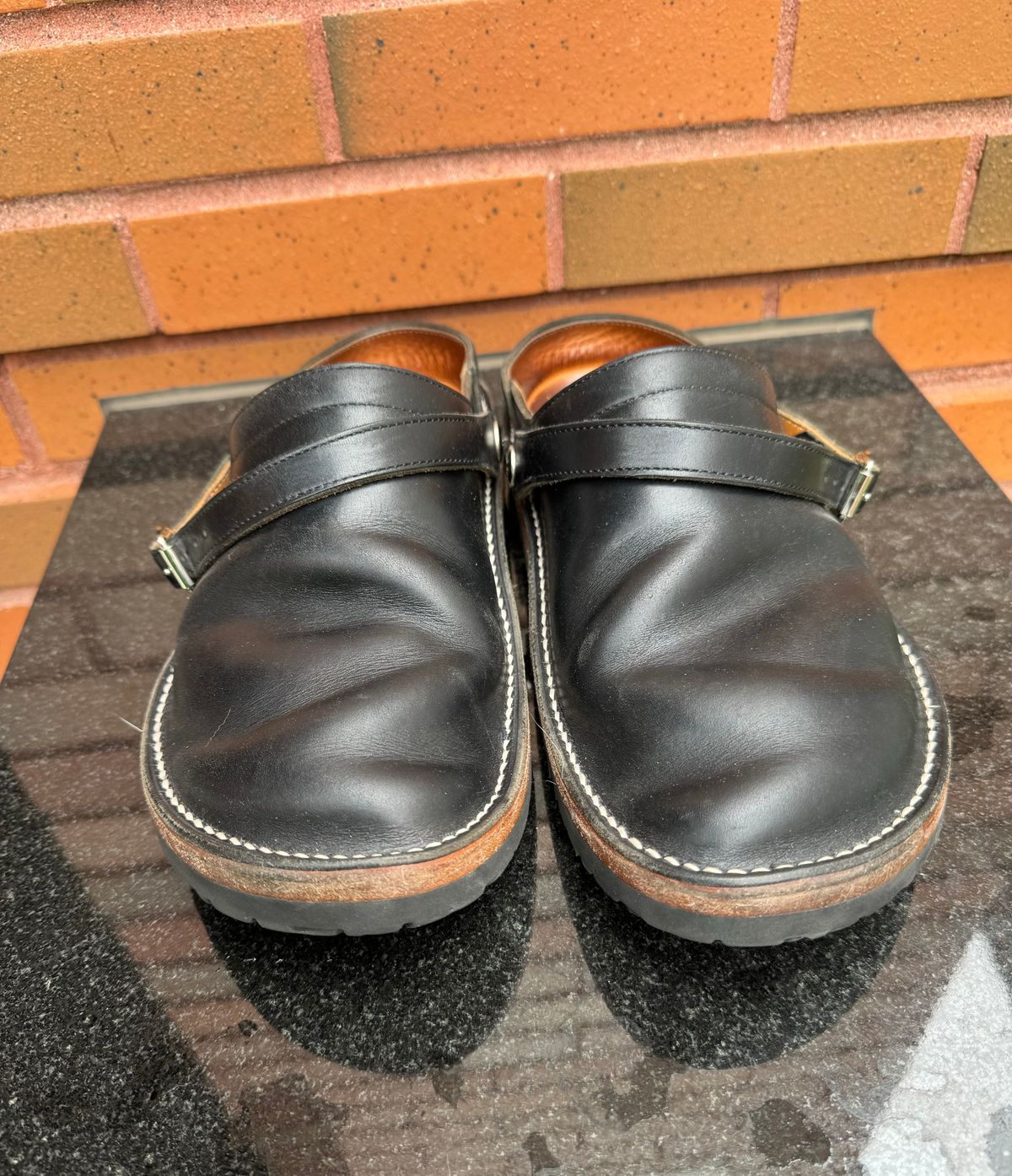 Photo by mister_stantastic on April 1, 2024 of the Zerrows Sabot Sandal in Horween Black Chromexcel.