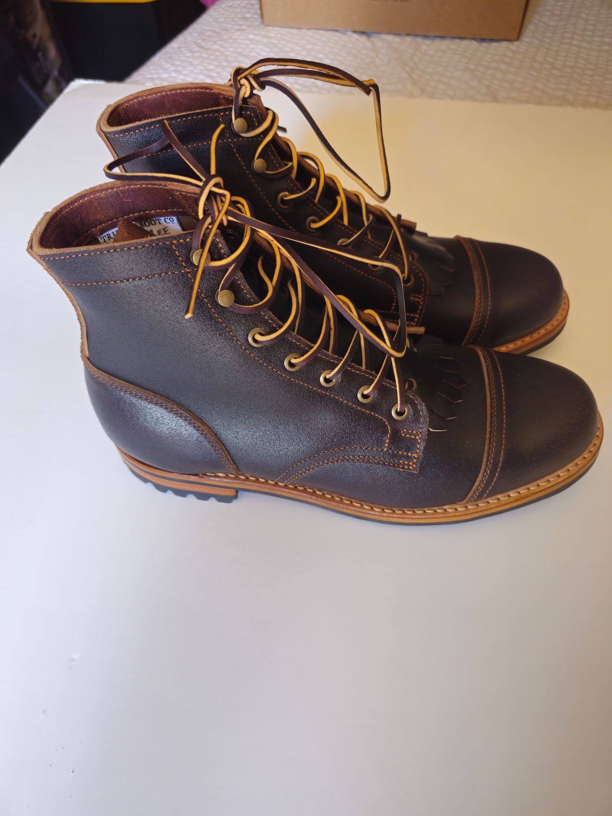 Photo by fozzie_the_bear on April 20, 2024 of the Truman Cap Toe Boot in Horween Java Waxed Flesh.