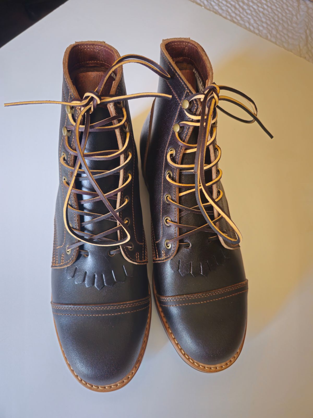 Photo by fozzie_the_bear on April 20, 2024 of the Truman Cap Toe Boot in Horween Java Waxed Flesh.