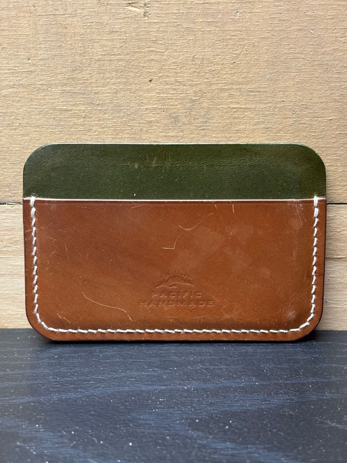 Photo by drew_15 on January 4, 2026 of the Pacific Handmade 3 Pocket Cardholder in Horween Amaretto Shell Cordovan & Horween Reverse Ultraviolet Shell Cordovan & Conceria Walpier Olive Buttero.