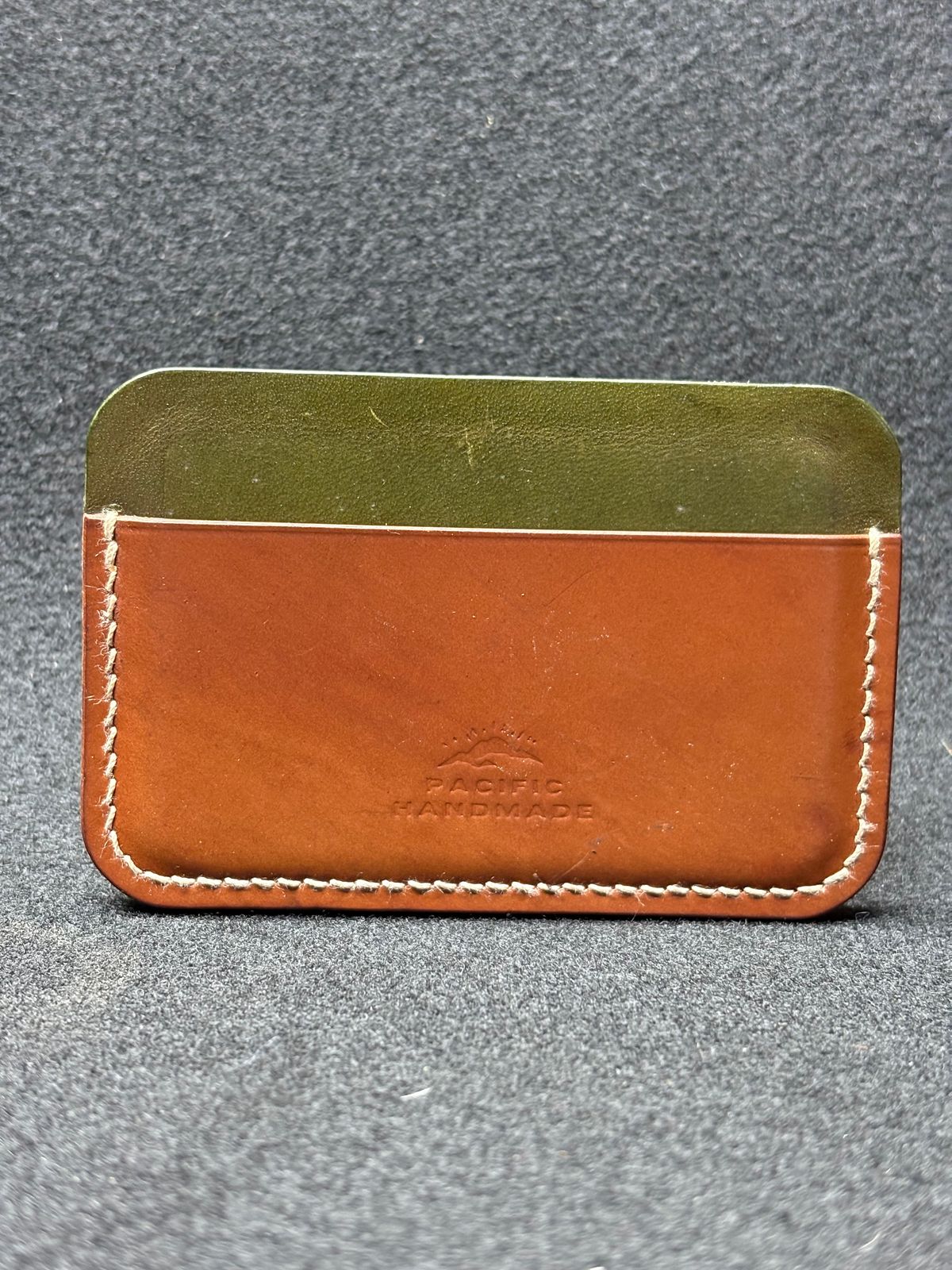 Photo by drew_15 on February 1, 2026 of the Pacific Handmade 3 Pocket Cardholder in Horween Amaretto Shell Cordovan & Horween Reverse Ultraviolet Shell Cordovan & Conceria Walpier Olive Buttero.
