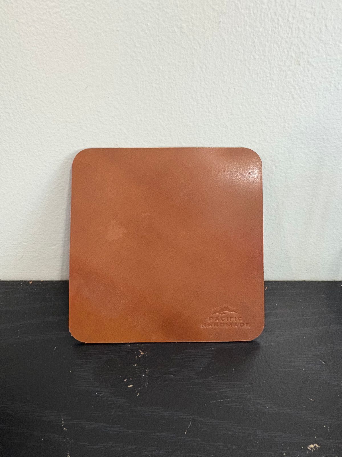 Photo by drew_15 on October 8, 2025 of the Pacific Handmade Coaster in Horween Bourbon Shell Cordovan.