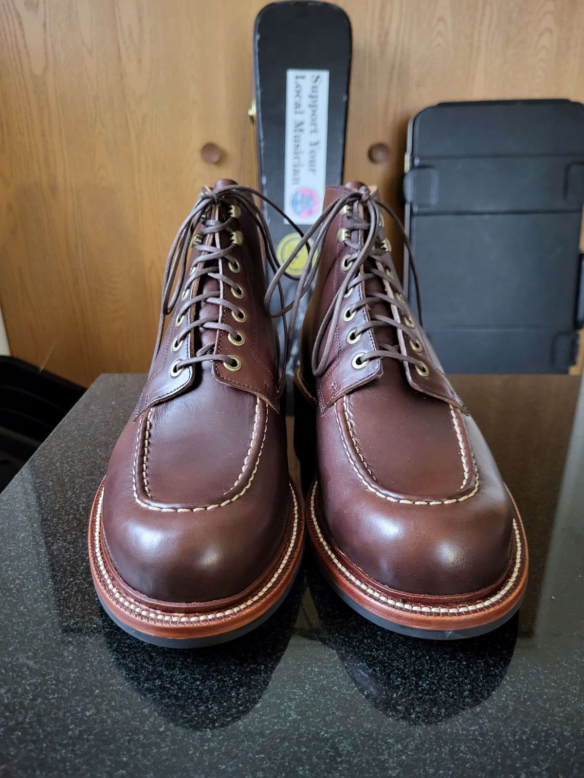 Photo by Mysterium on November 5, 2023 of the Grant Stone Brass Boot in Horween Crimson Chromexcel.
