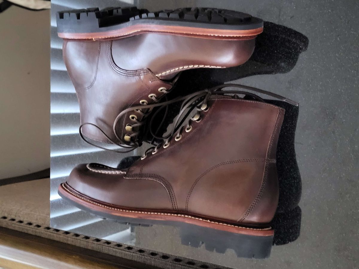 Photo by Mysterium on November 5, 2023 of the Grant Stone Brass Boot in Horween Crimson Chromexcel.