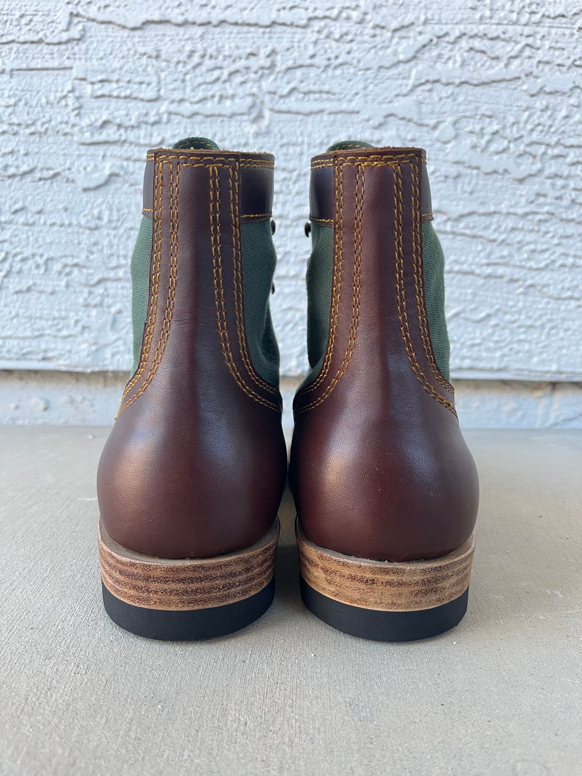 Photo by udi on November 5, 2024 of the Akito Trooper Boots in Veg-tanned, Vintage Brown Hand Finished/12oz Army Green Duck Canvas.