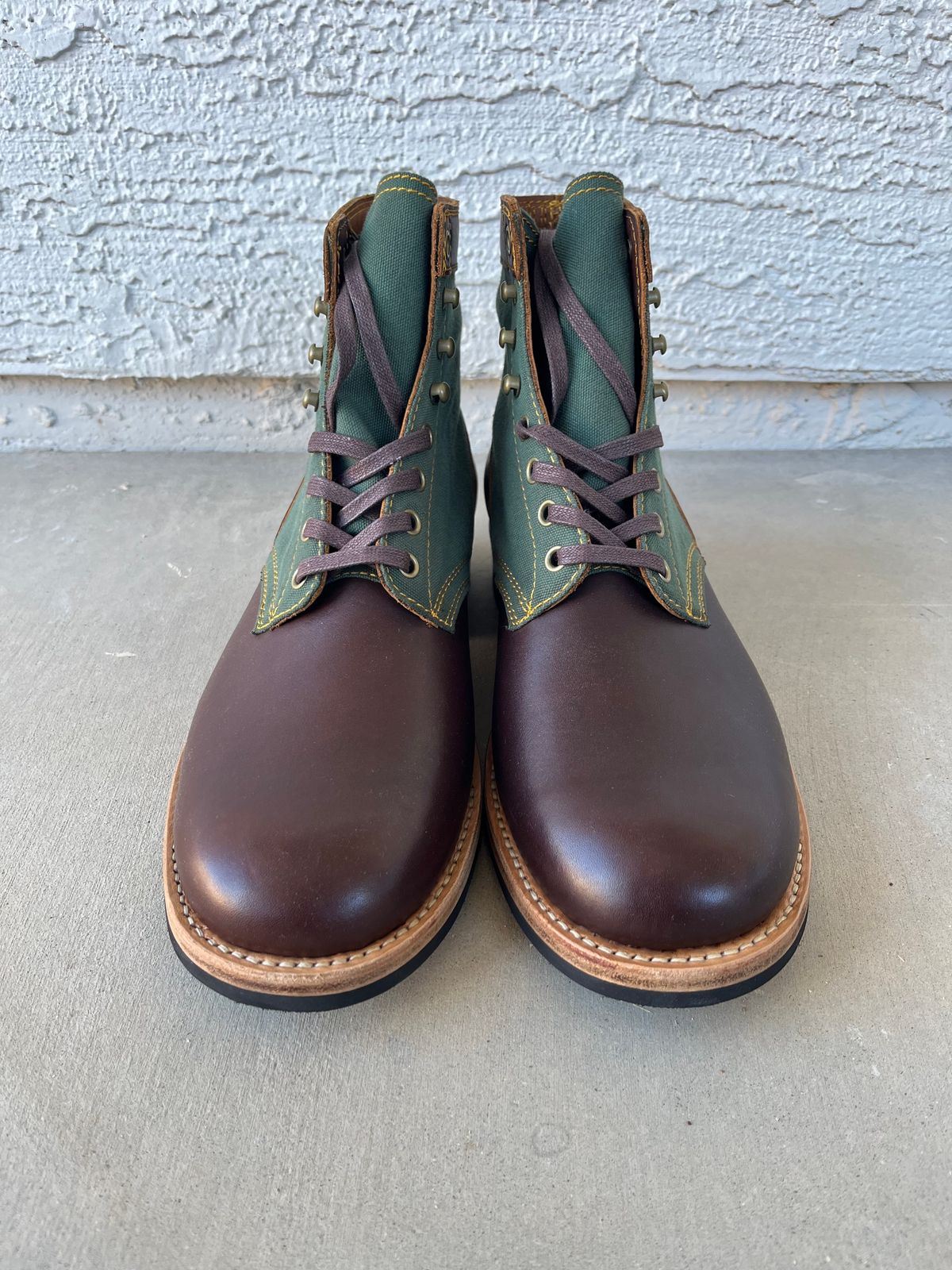 Photo by udi on November 5, 2024 of the Akito Trooper Boots in Veg-tanned, Vintage Brown Hand Finished/12oz Army Green Duck Canvas.