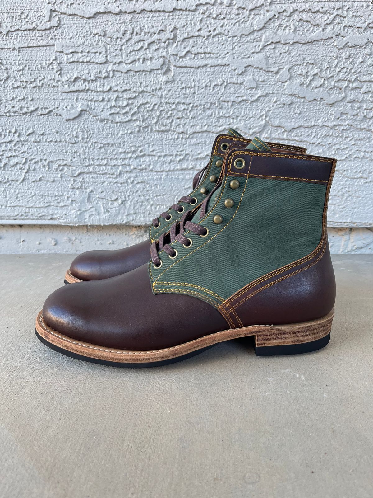 Photo by udi on November 5, 2024 of the Akito Trooper Boots in Veg-tanned, Vintage Brown Hand Finished/12oz Army Green Duck Canvas.