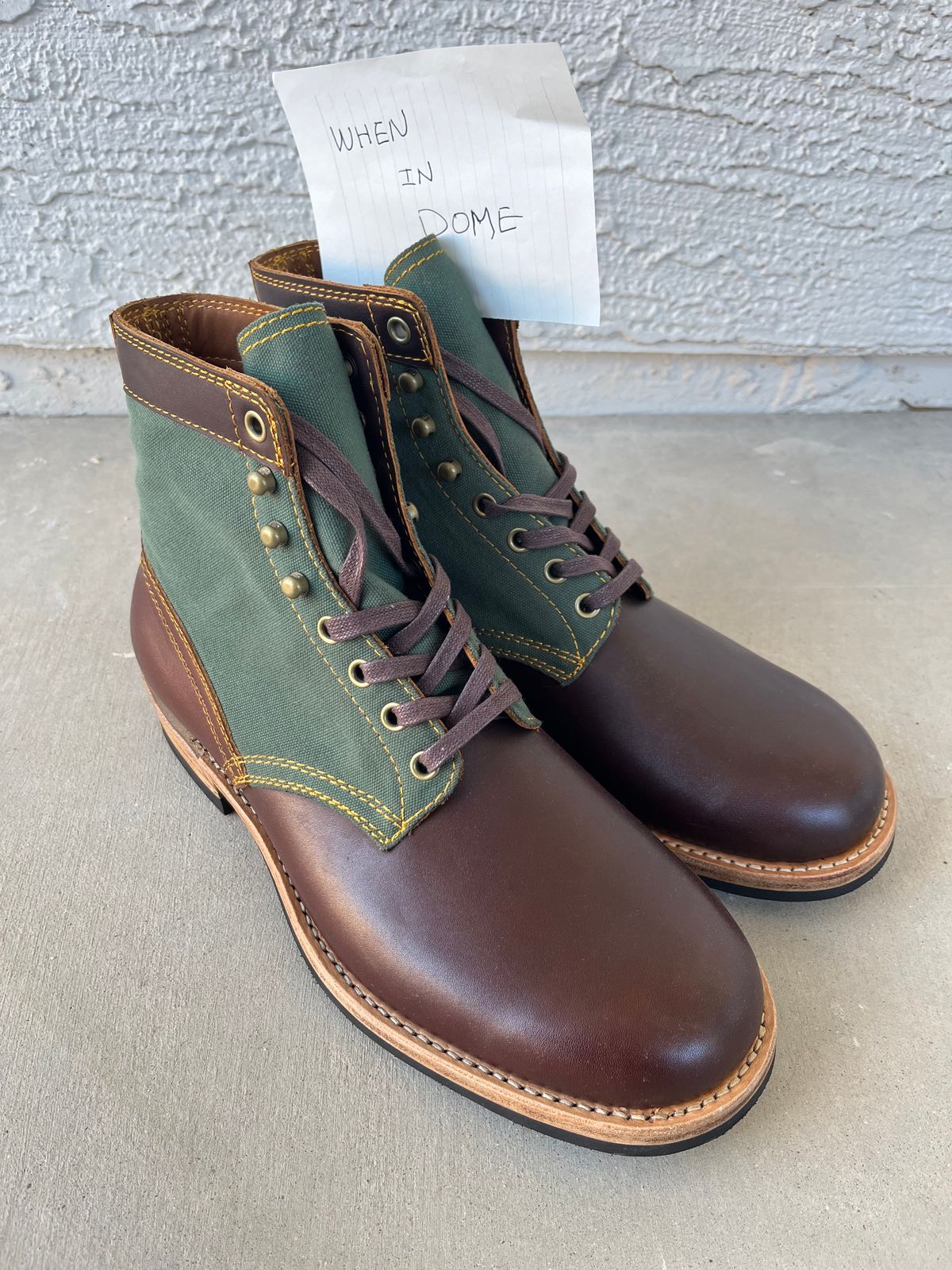 Photo by udi on November 5, 2024 of the Akito Trooper Boots in Veg-tanned, Vintage Brown Hand Finished/12oz Army Green Duck Canvas.
