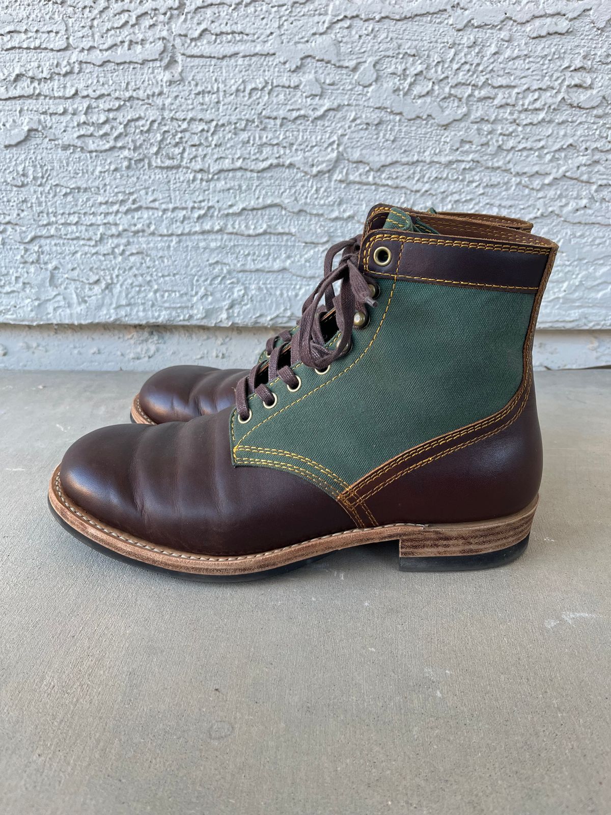 Photo by udi on December 4, 2024 of the Akito Trooper Boots in Veg-tanned, Vintage Brown Hand Finished/12oz Army Green Duck Canvas.