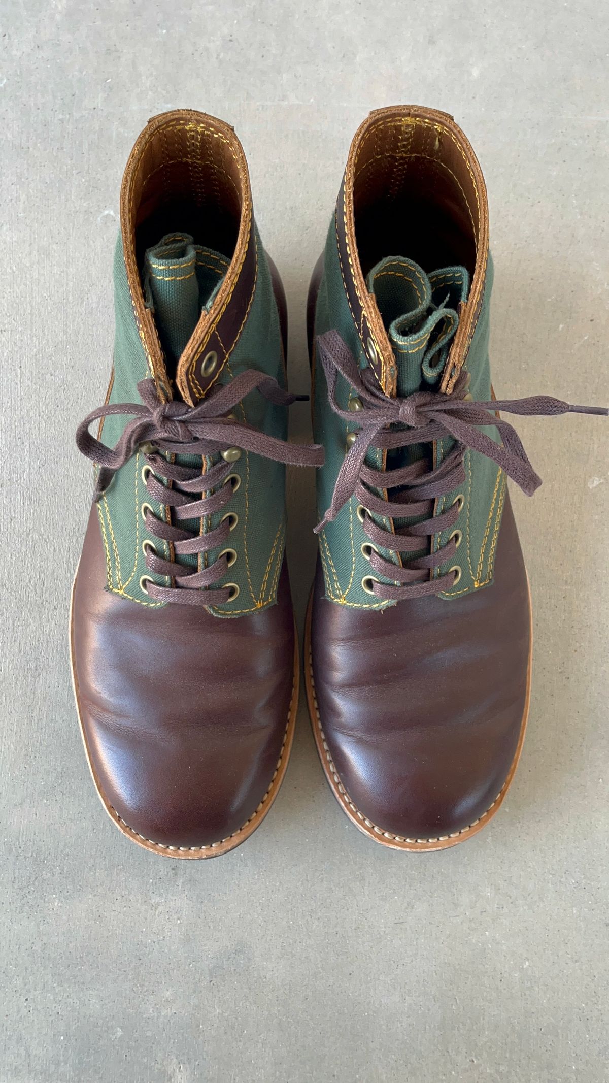 Photo by udi on December 4, 2024 of the Akito Trooper Boots in Veg-tanned, Vintage Brown Hand Finished/12oz Army Green Duck Canvas.