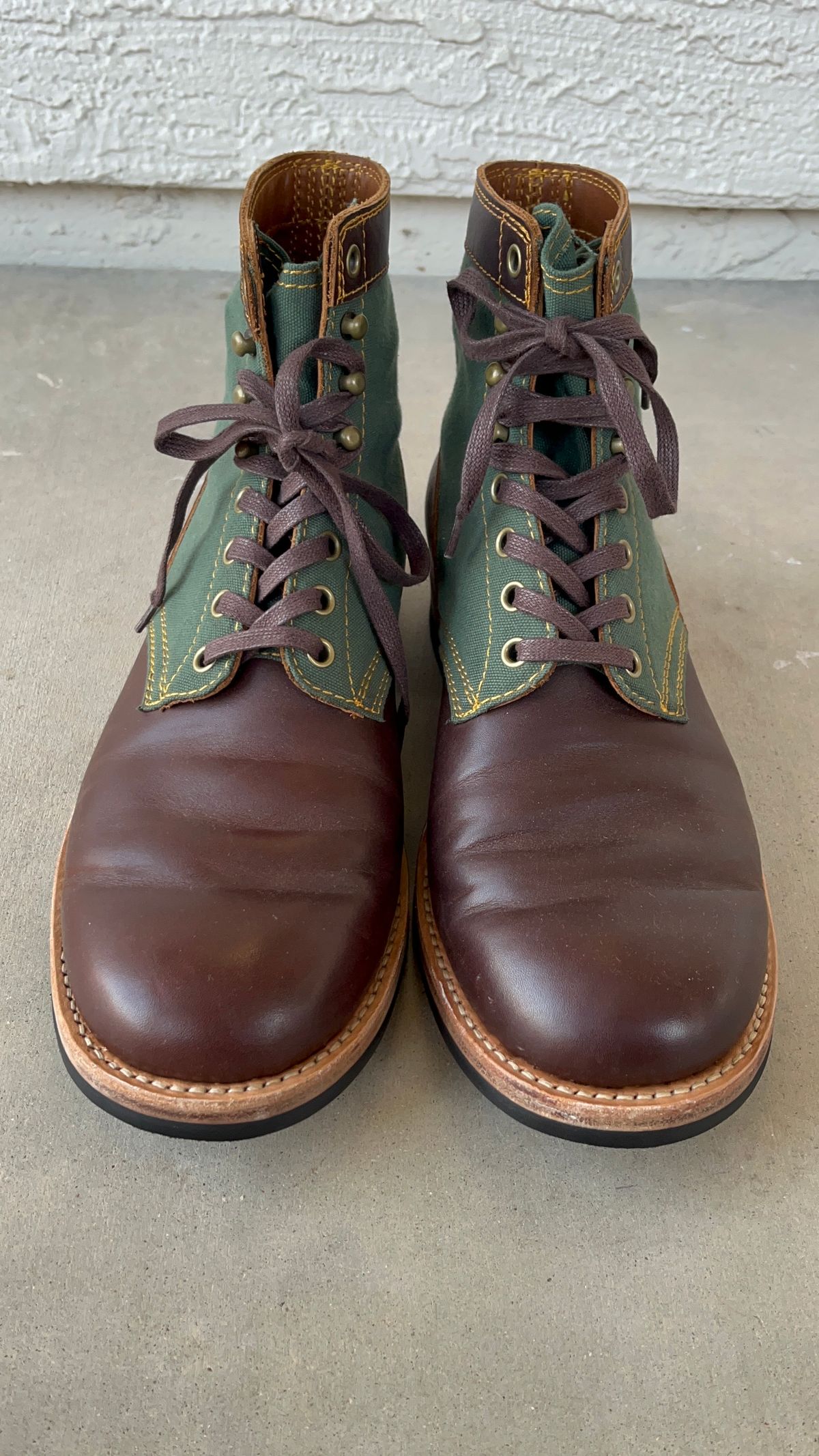 Photo by udi on January 6, 2025 of the Akito Trooper Boots in Veg-tanned, Vintage Brown Hand Finished/12oz Army Green Duck Canvas.