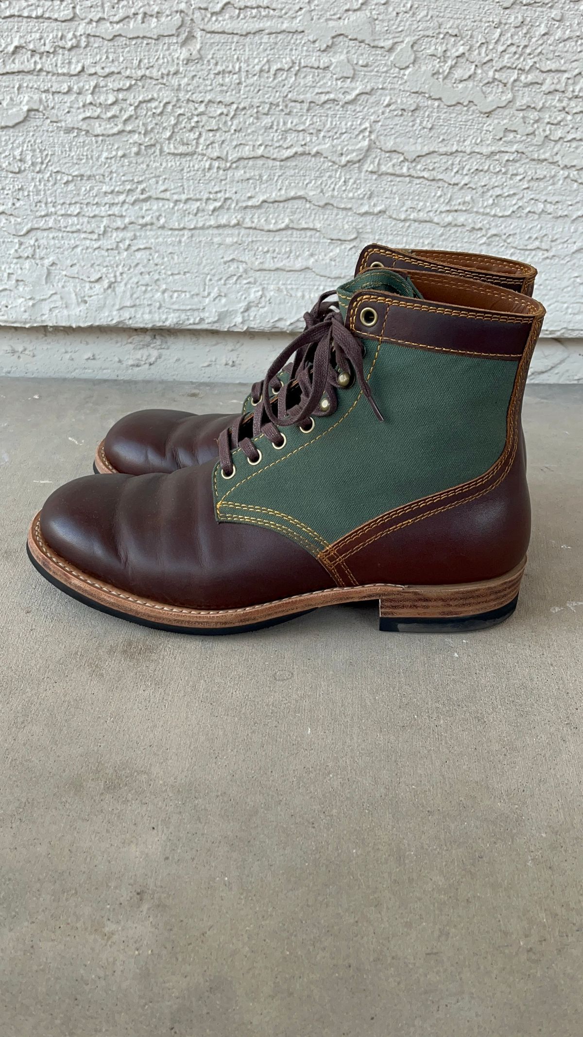 Photo by udi on January 6, 2025 of the Akito Trooper Boots in Veg-tanned, Vintage Brown Hand Finished/12oz Army Green Duck Canvas.