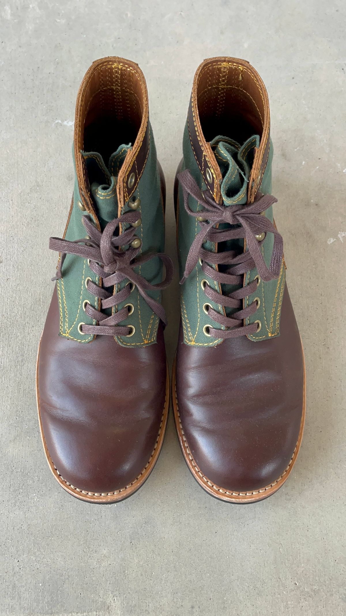 Photo by udi on January 6, 2025 of the Akito Trooper Boots in Veg-tanned, Vintage Brown Hand Finished/12oz Army Green Duck Canvas.