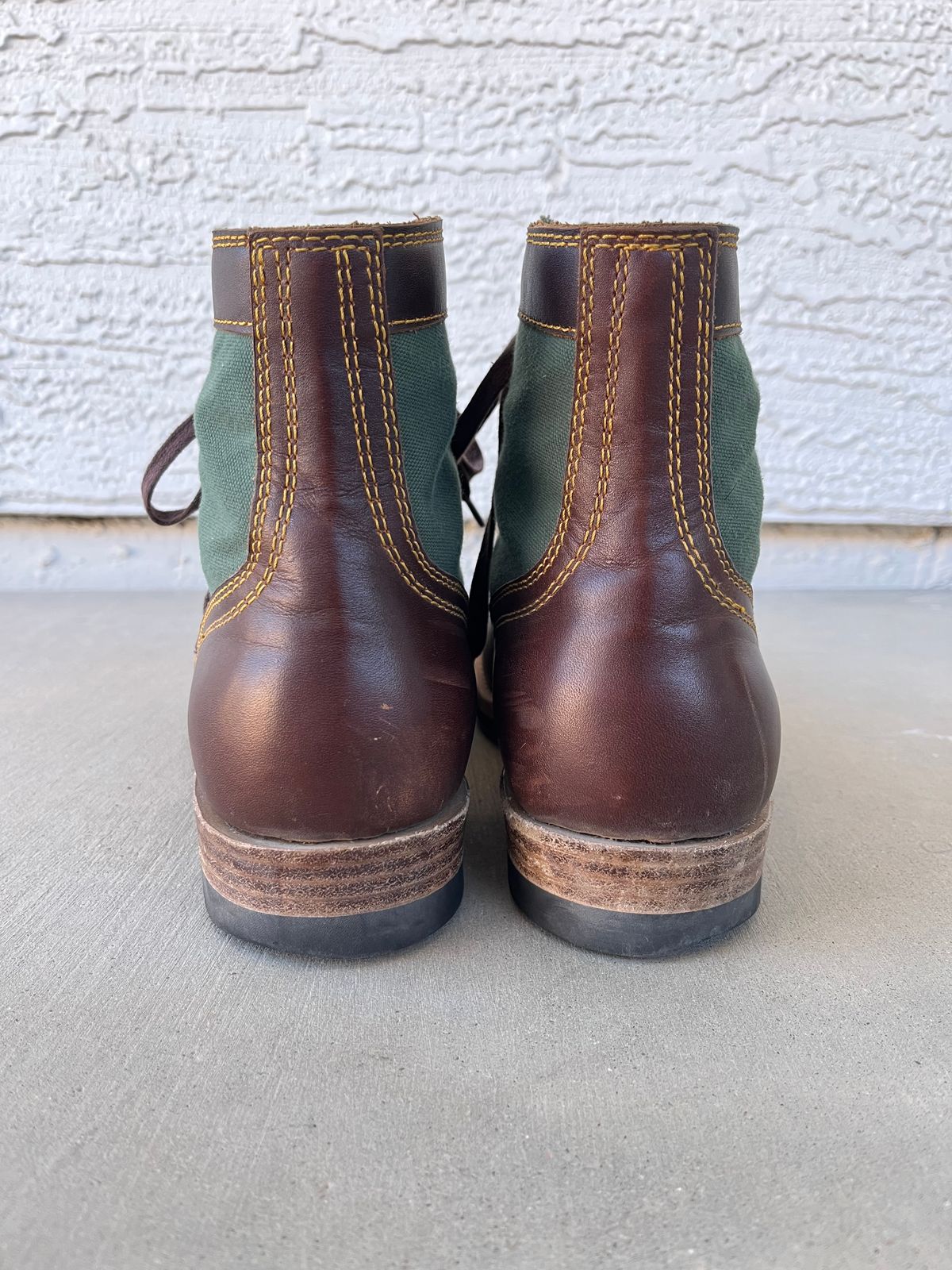 Photo by udi on February 5, 2025 of the Akito Trooper Boots in Veg-tanned, Vintage Brown Hand Finished/12oz Army Green Duck Canvas.