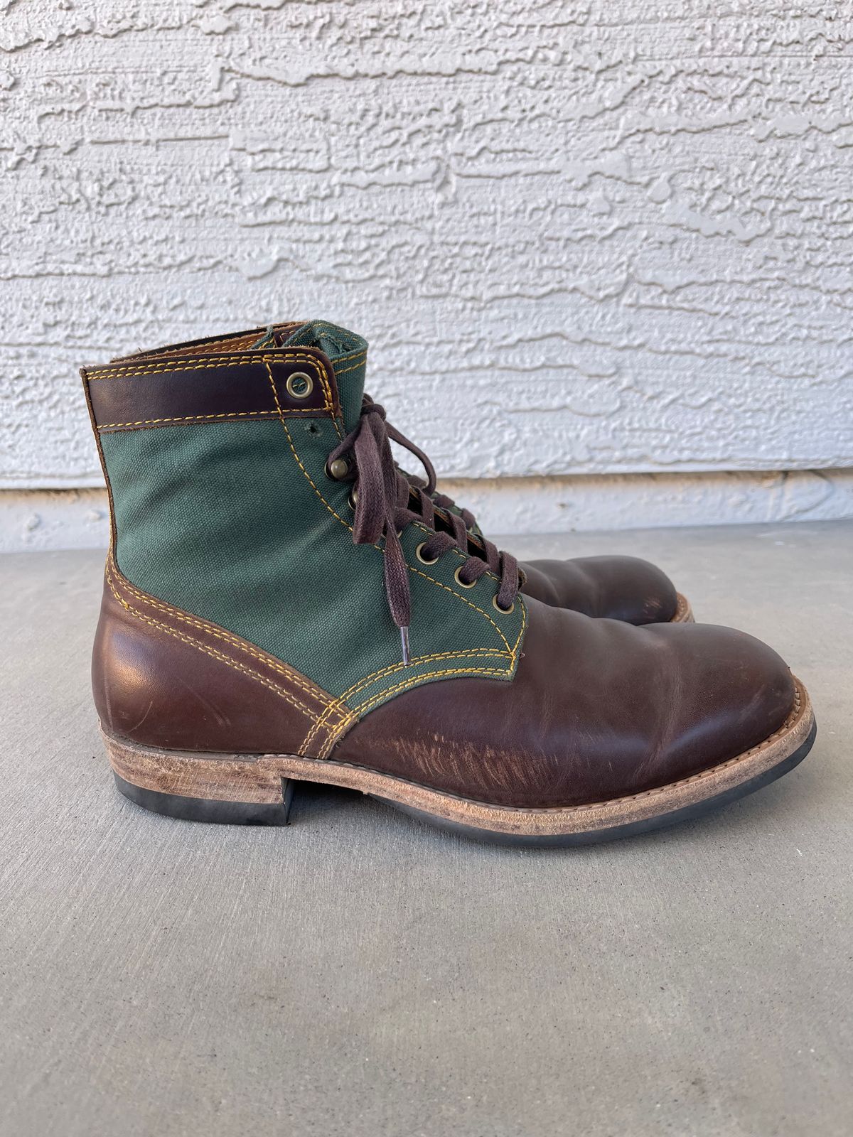 Photo by udi on February 5, 2025 of the Akito Trooper Boots in Veg-tanned, Vintage Brown Hand Finished/12oz Army Green Duck Canvas.