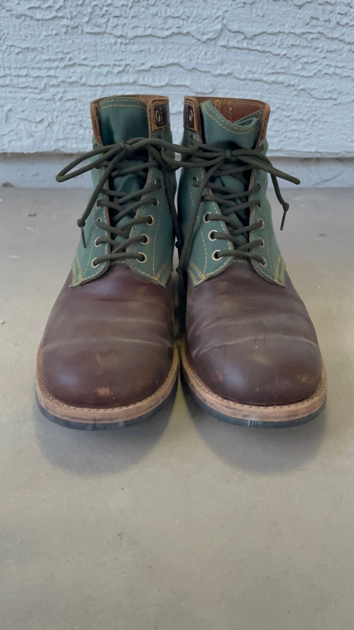 Photo by udi on March 6, 2025 of the Akito Trooper Boots in Veg-tanned, Vintage Brown Hand Finished/12oz Army Green Duck Canvas.