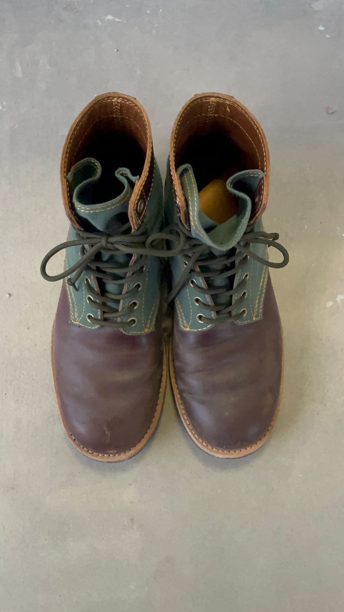 Photo by udi on March 6, 2025 of the Akito Trooper Boots in Veg-tanned, Vintage Brown Hand Finished/12oz Army Green Duck Canvas.