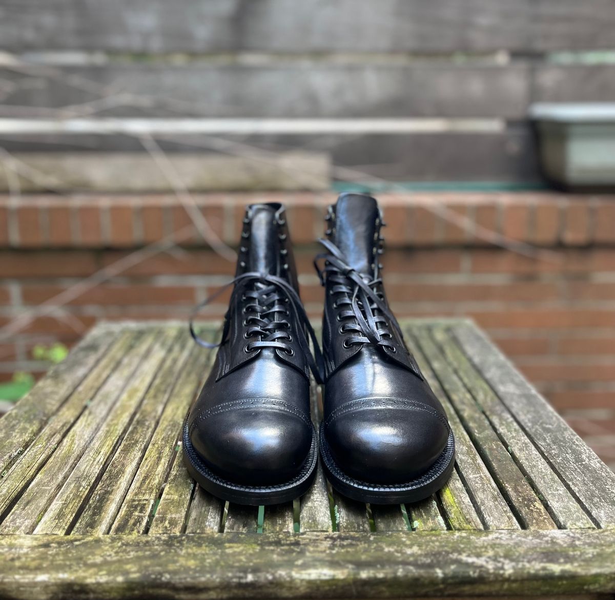 Photo by DesperadoUnderTheEaves on October 4, 2024 of the Black Sign Army Last Mid Cut Dress Boot in Black Kangaroo (Made in Italy).