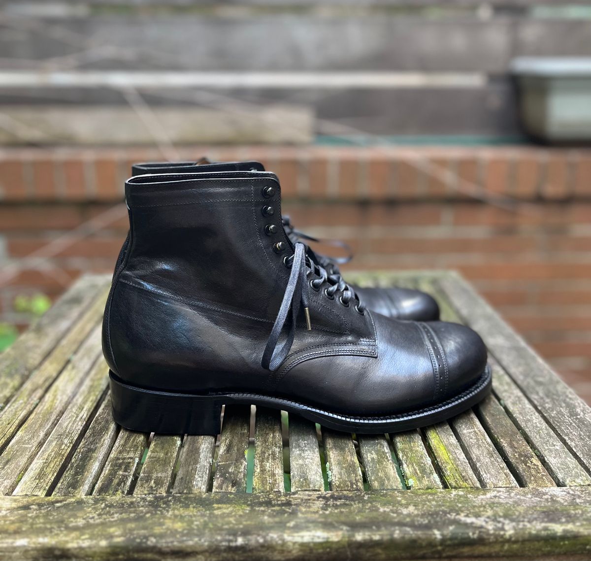 Photo by DesperadoUnderTheEaves on October 4, 2024 of the Black Sign Army Last Mid Cut Dress Boot in Black Kangaroo (Made in Italy).