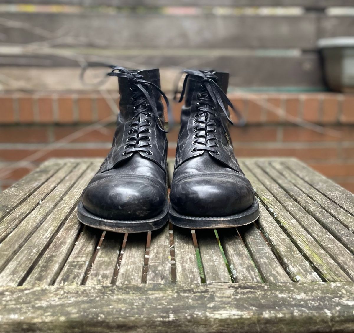 Photo by DesperadoUnderTheEaves on December 6, 2024 of the Black Sign Army Last Mid Cut Dress Boot in Black Kangaroo (Made in Italy).